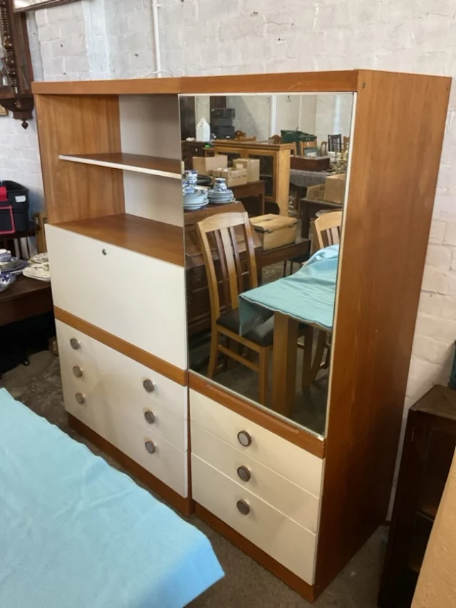 A 70s Schreiber wall unit with shelves, secretaire desk above drawers