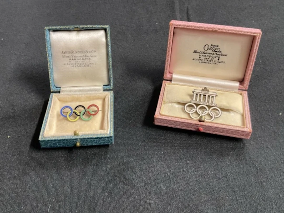 A 1936 Berlin Olympics gilt and enamelled brooch by Paulmann & Crone