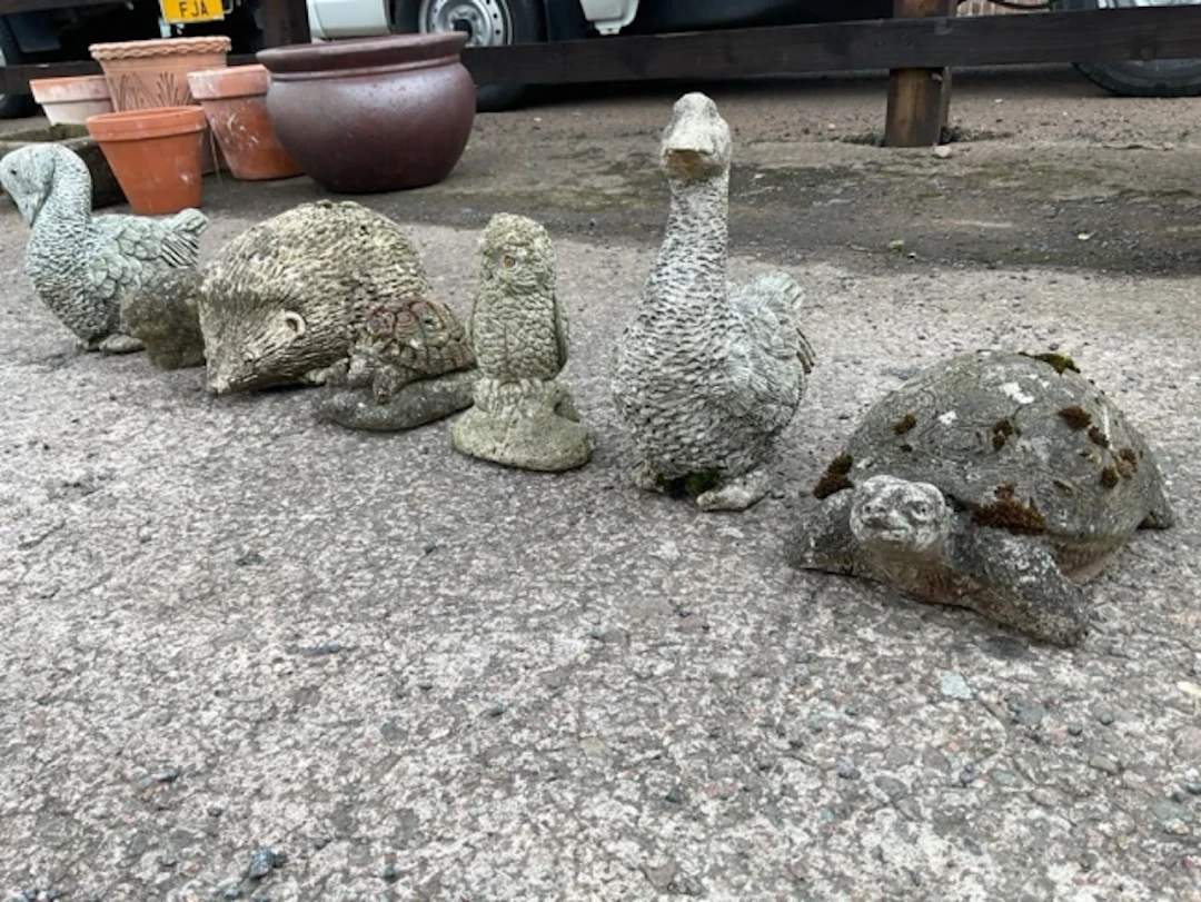 Seven miscellaneous composition stone garden ornaments - hedgehog
