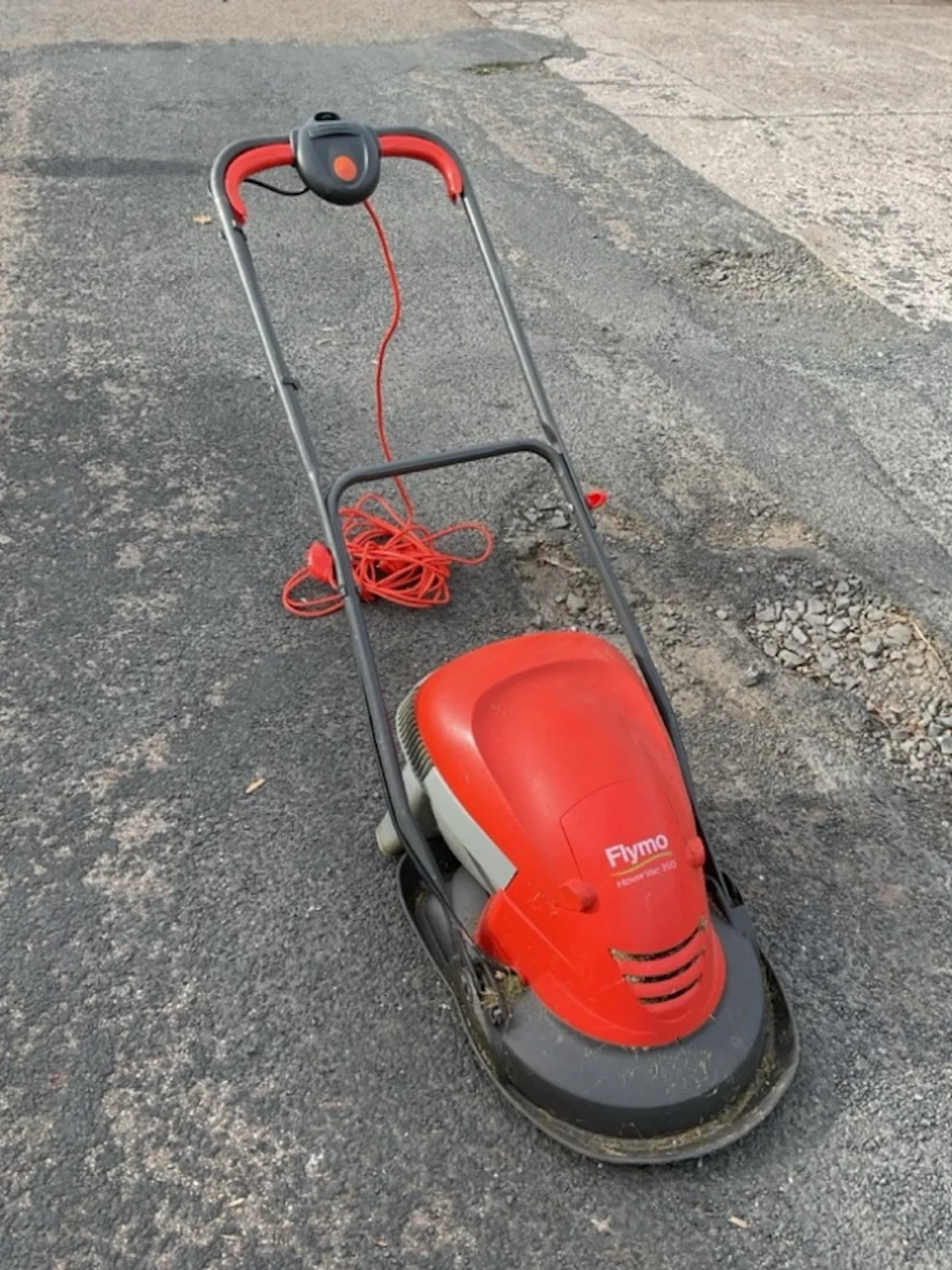 An electric Flymo garden hoover vac 250, the machine complete with cable.