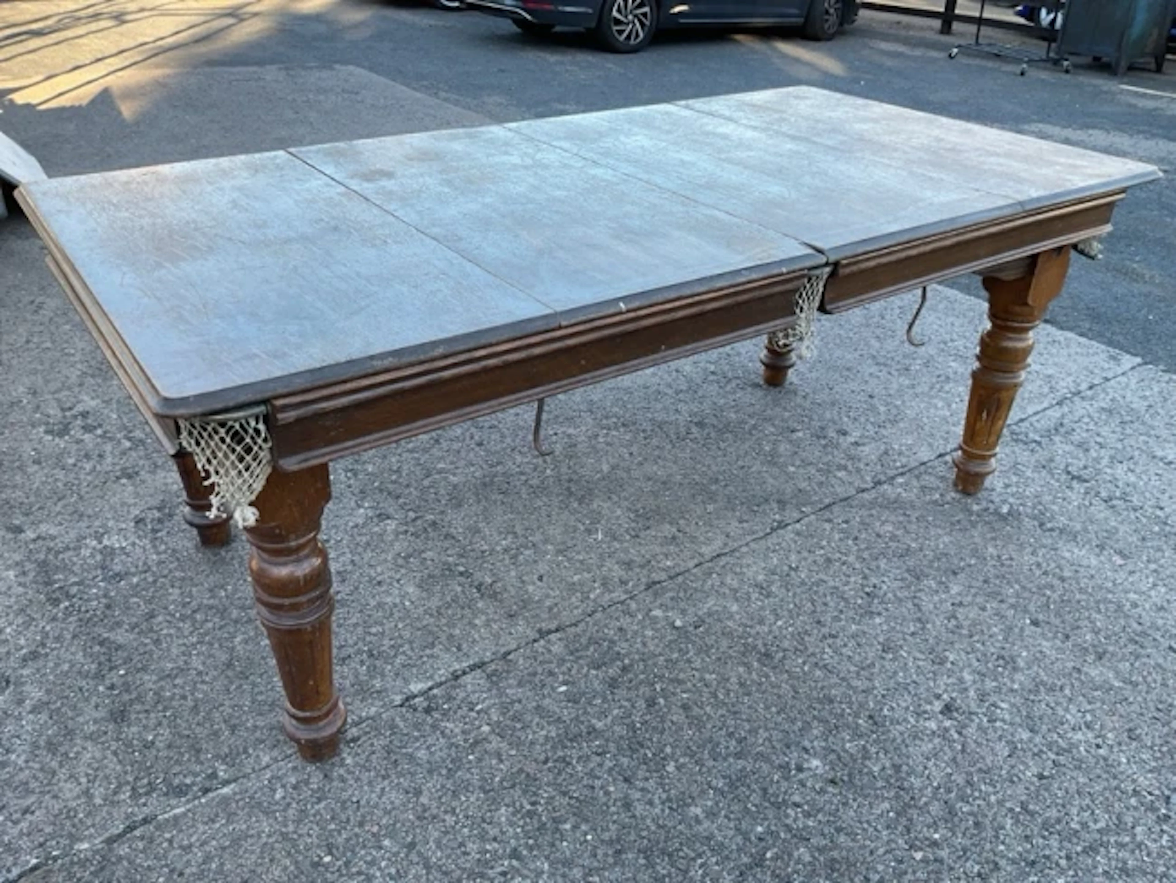 An Edwardian Riley oak dining/snooker table, the rectangular moulded