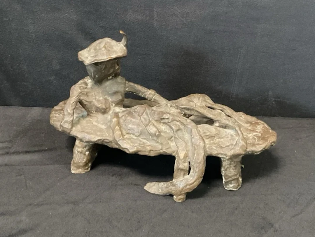 Donat, bronze, semi-abstract sculpture of a lady with feathered hat