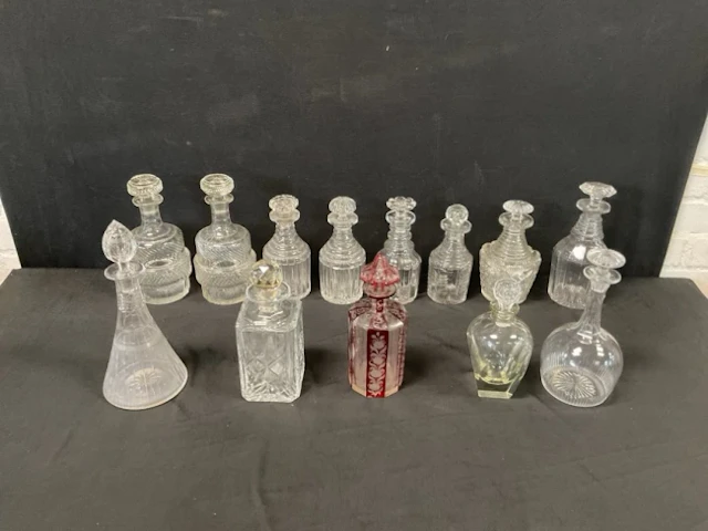 A quantity of decanters & stoppers - nineteenth & eighteenth century