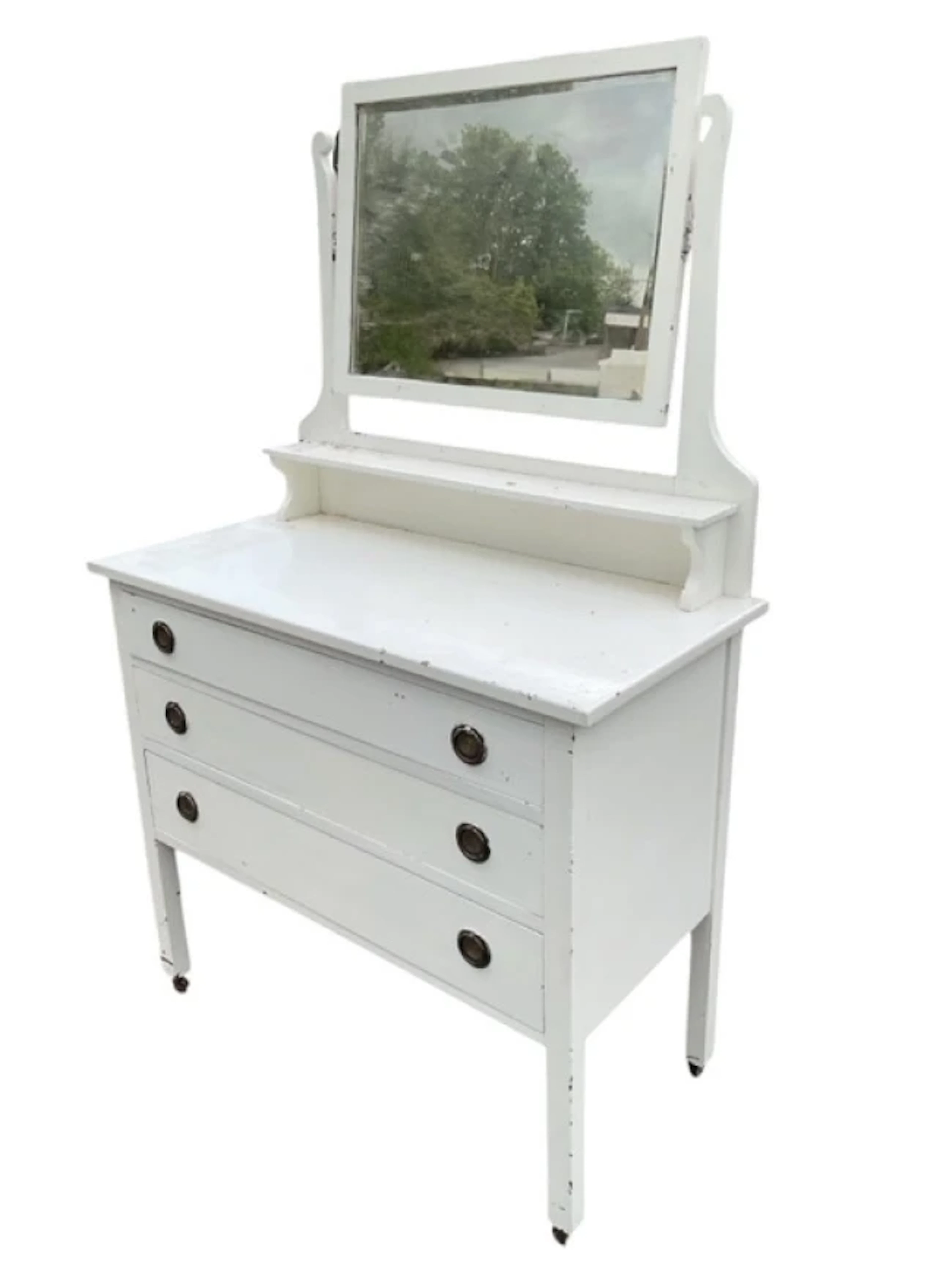 An Edwardian painted mahogany dressing table, the rectangular bevelled