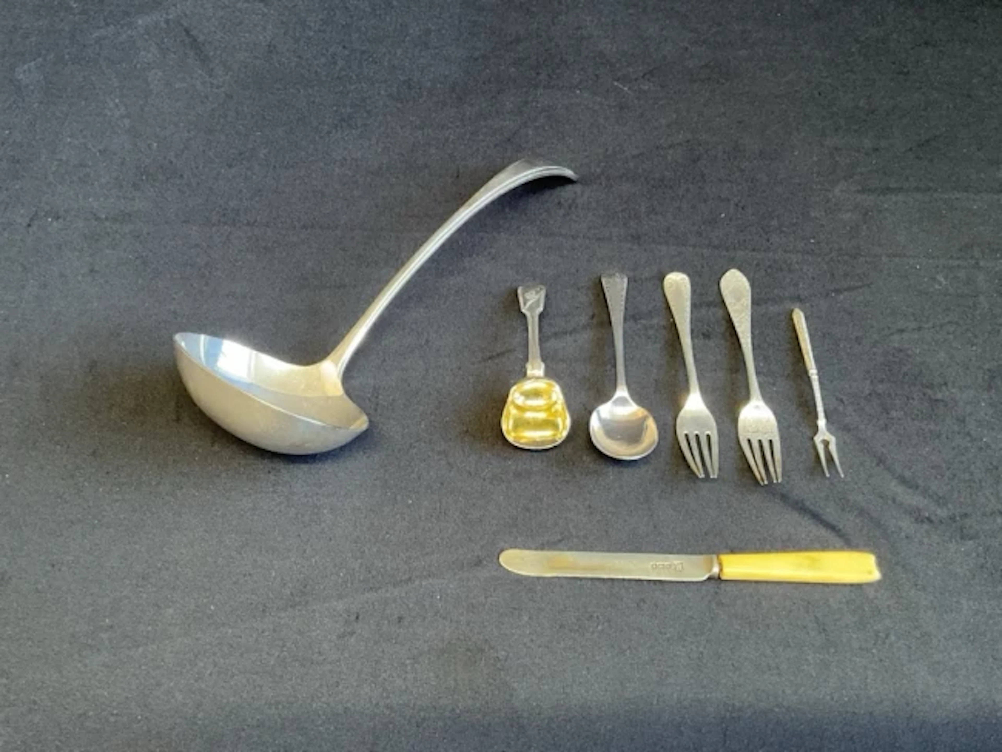 Miscellaneous hallmarked silver - a Sheffield ladle, a London sugar
