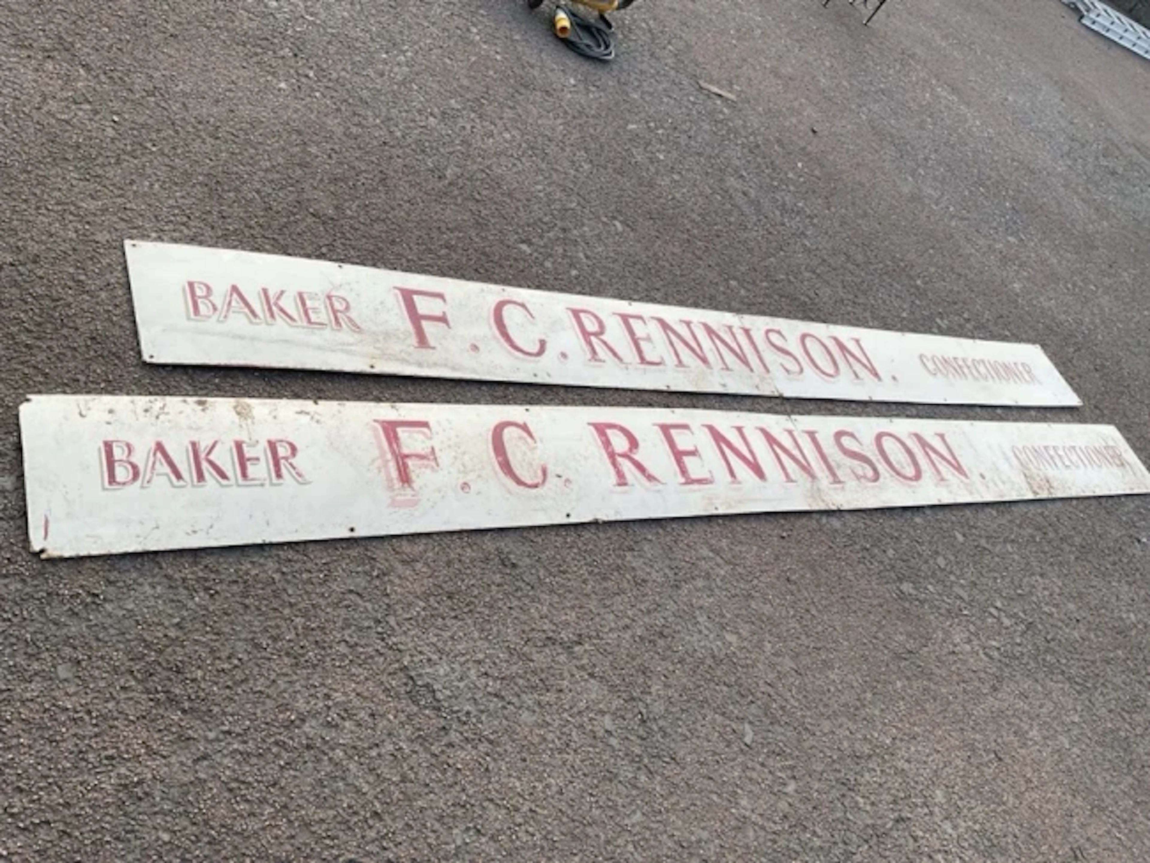 Two old sign written shop signboards for a baker & confectioner, each