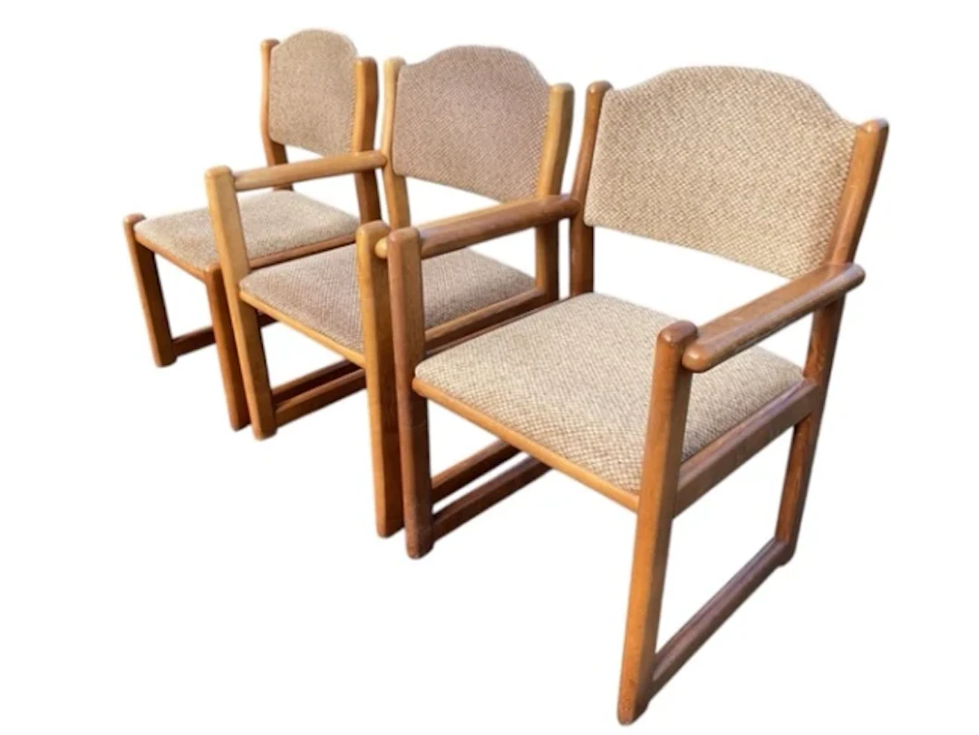 A set of three Welzel beech armchairs with rectangular rounded frames