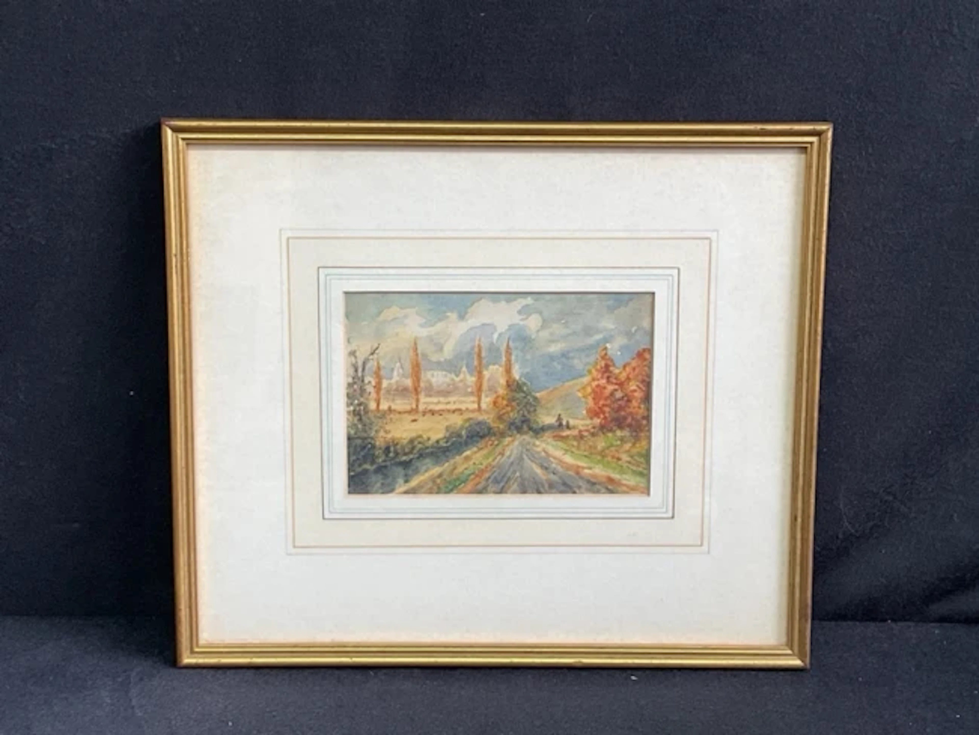 C20th watercolour, river landscape with distant buildings, poplars