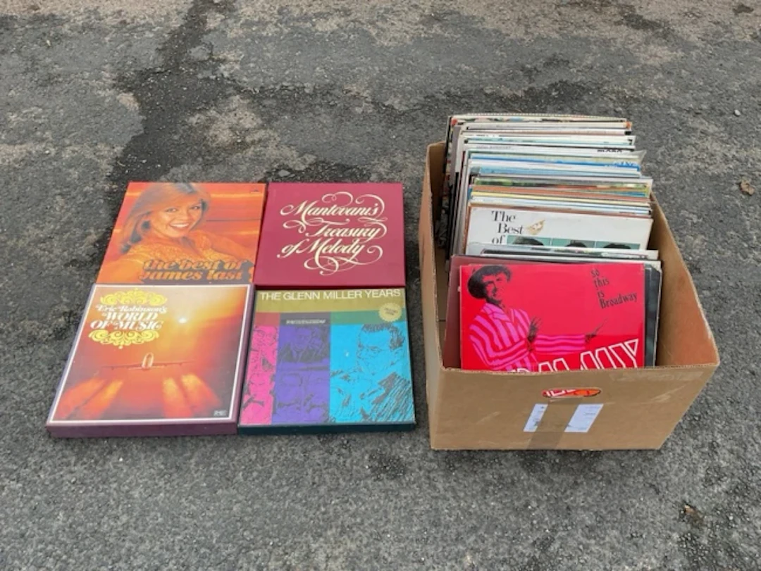 A collection of vinyl records- folk, James Galway, musicals, pop