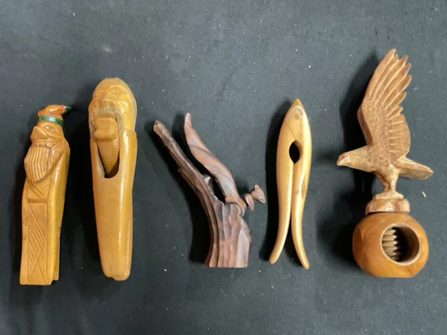 Five hand-carved nut crackers - two birch gnome heads with articulated