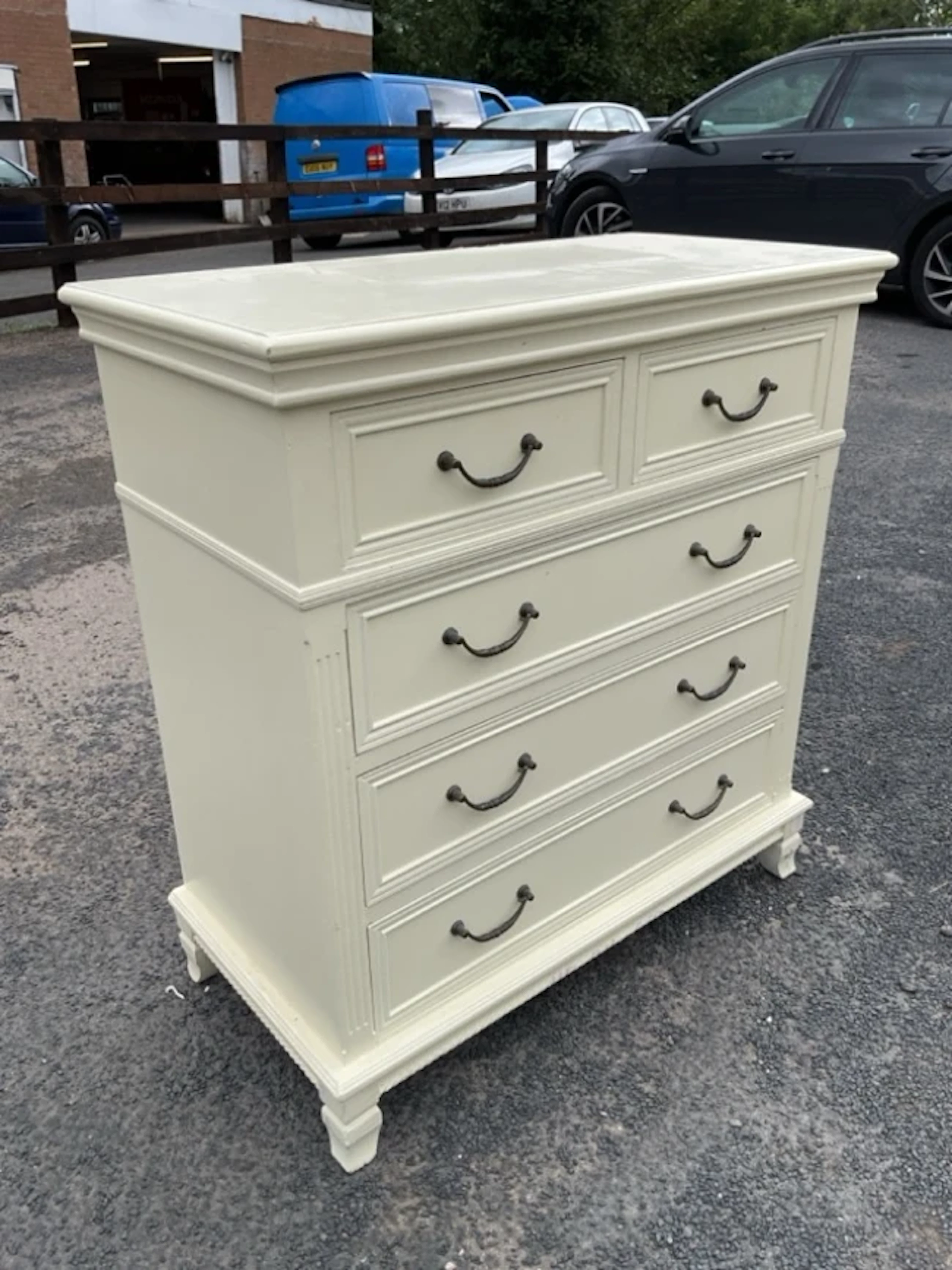 A painted reproduction Georgian style chest with two short and three