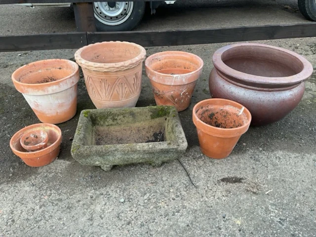 A rectangular composition stone garden trough; a large basin shaped