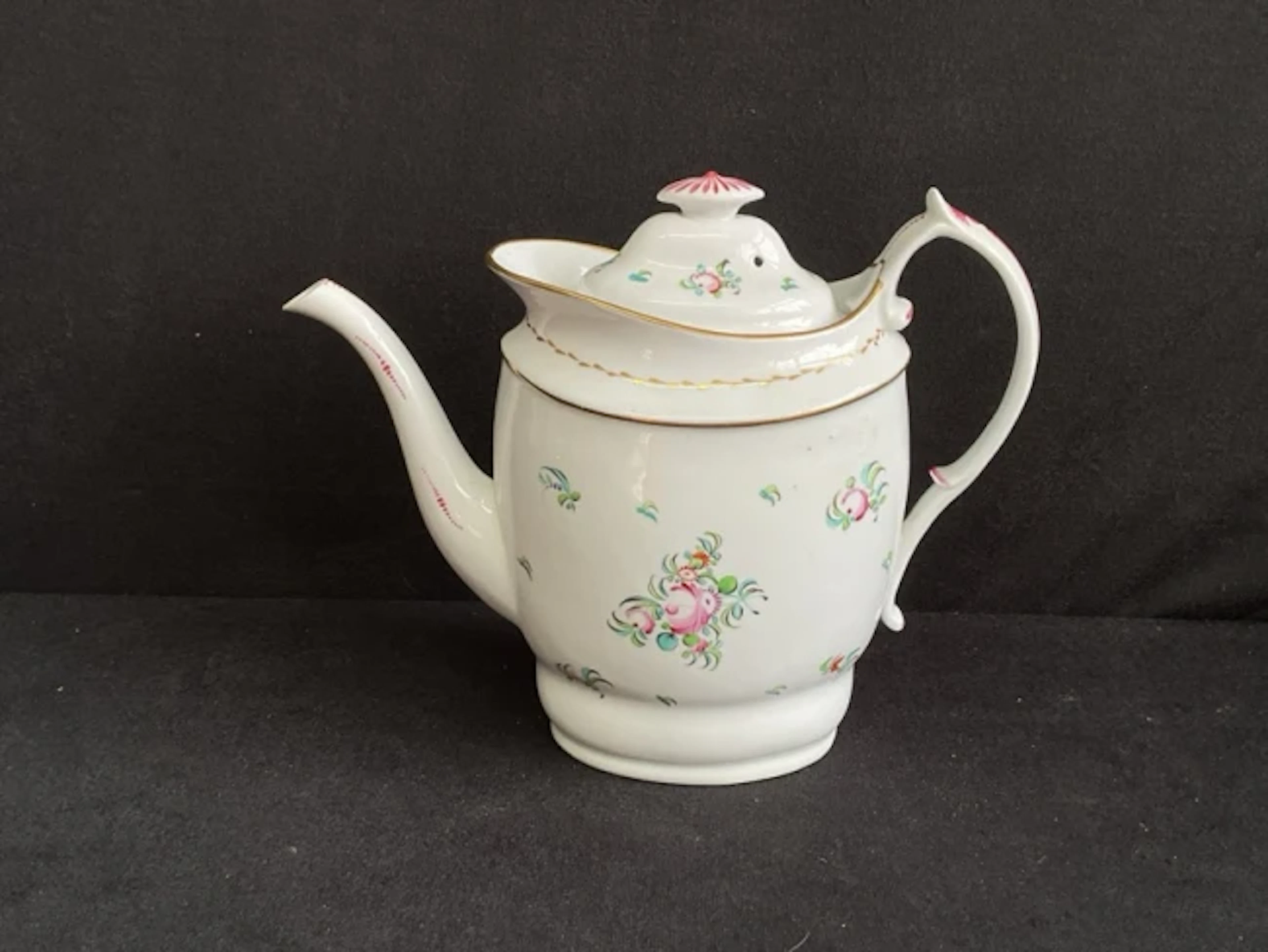 An early C19th New Hall porcelain navette shaped coffee pot with domed