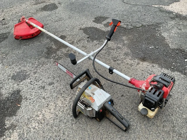 A petrol powered 43cc garden strimmer; and a McCulloch petrol chainsaw.