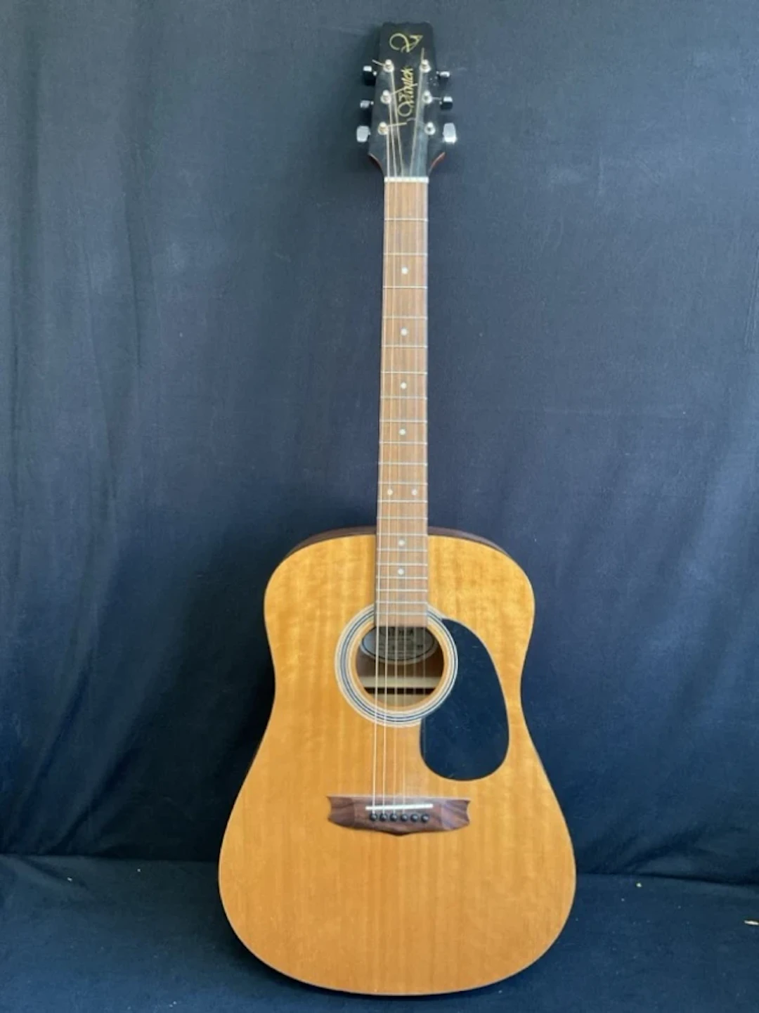 A Vantek steel string acoustic guitar with cedar body, hardwood fingerboard
