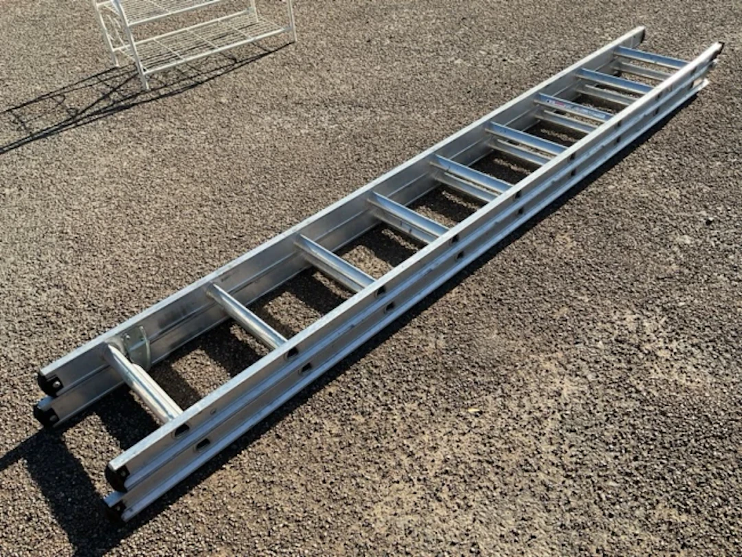 A two-section aluminium extending ladder, each piece with nine triangular