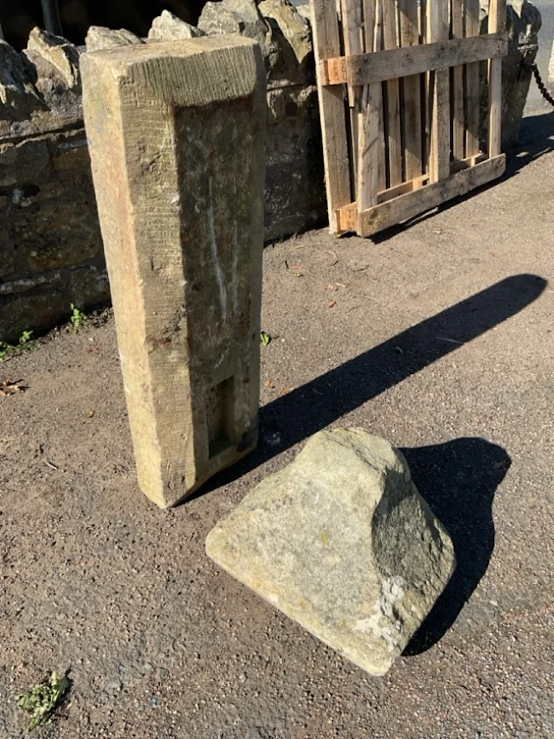 A rectangular chamfered sandstone lintel or sill, cut with rebate;