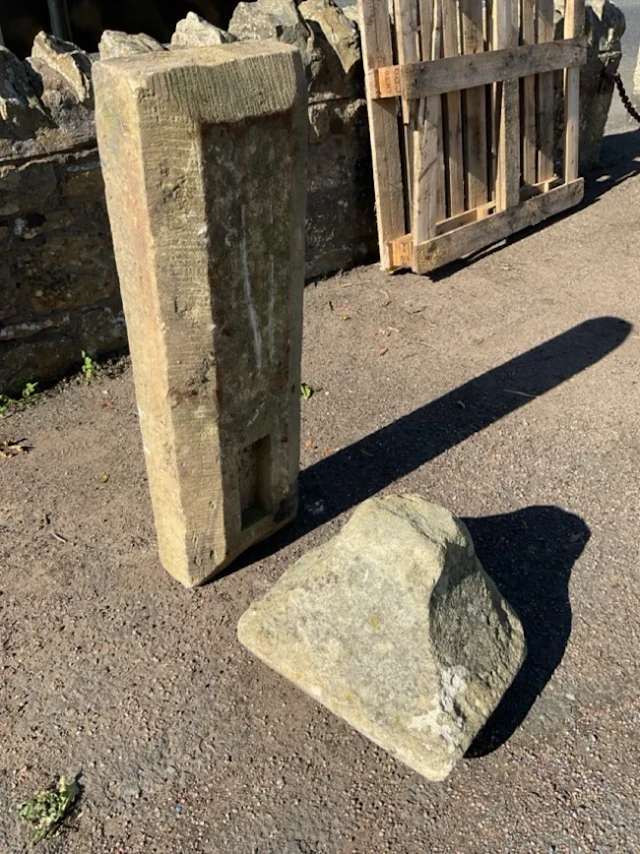 A rectangular chamfered sandstone lintel or sill, cut with rebate;