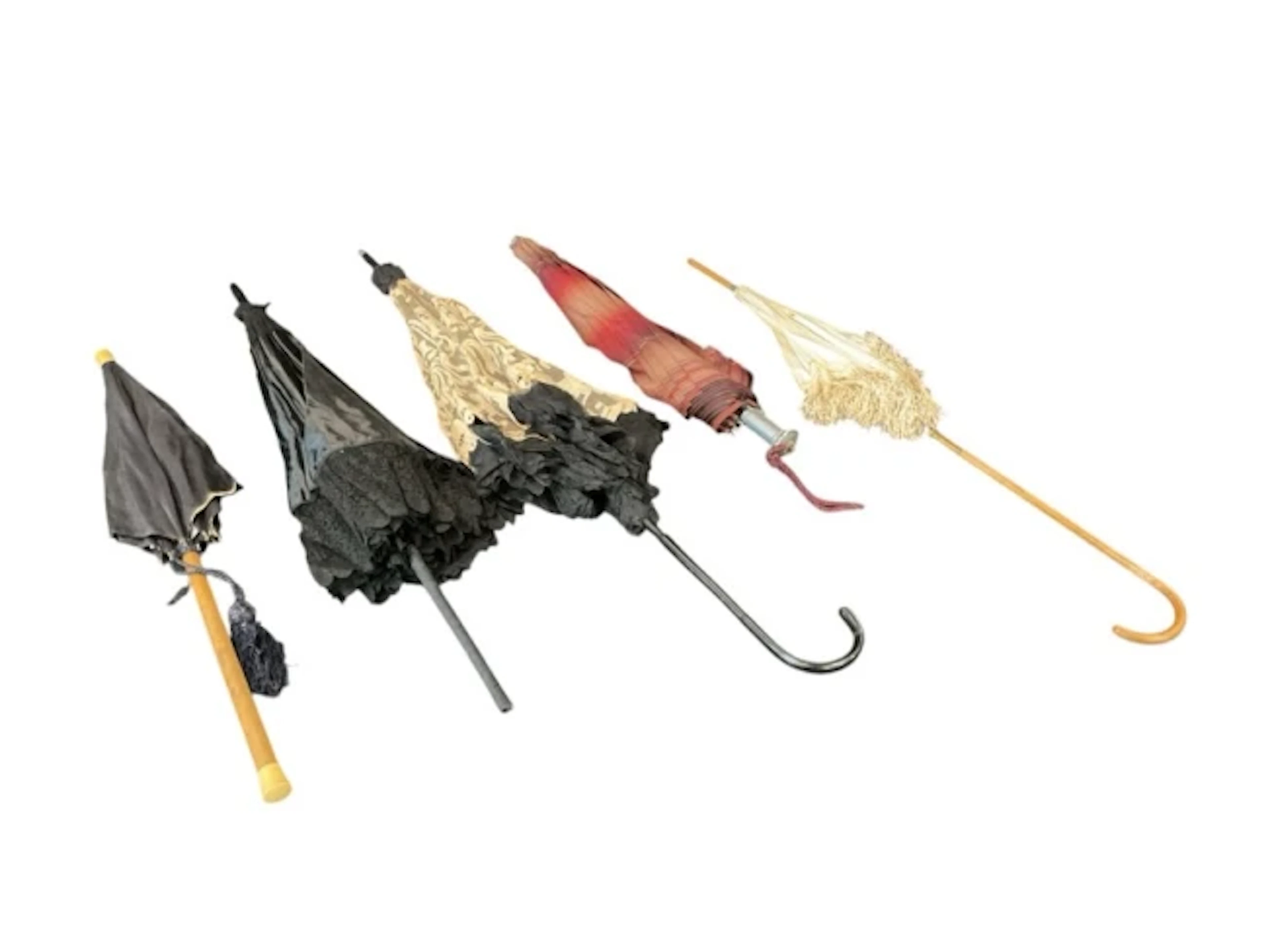 Four Edwardian ladies parasols - black silk with tassel and cylindrical