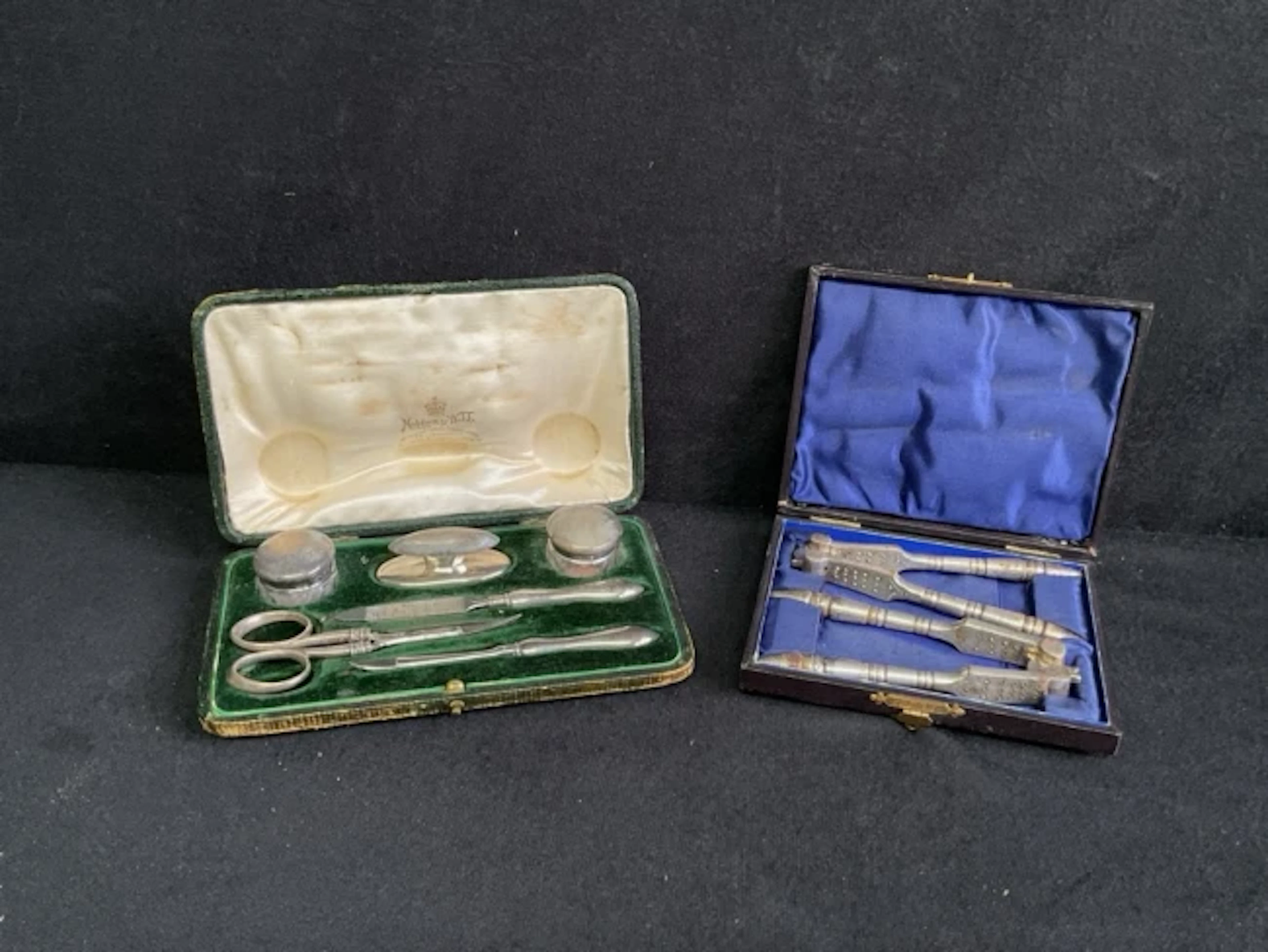 A Mappin & Webb leather cased silver mounted manicure set comprising
