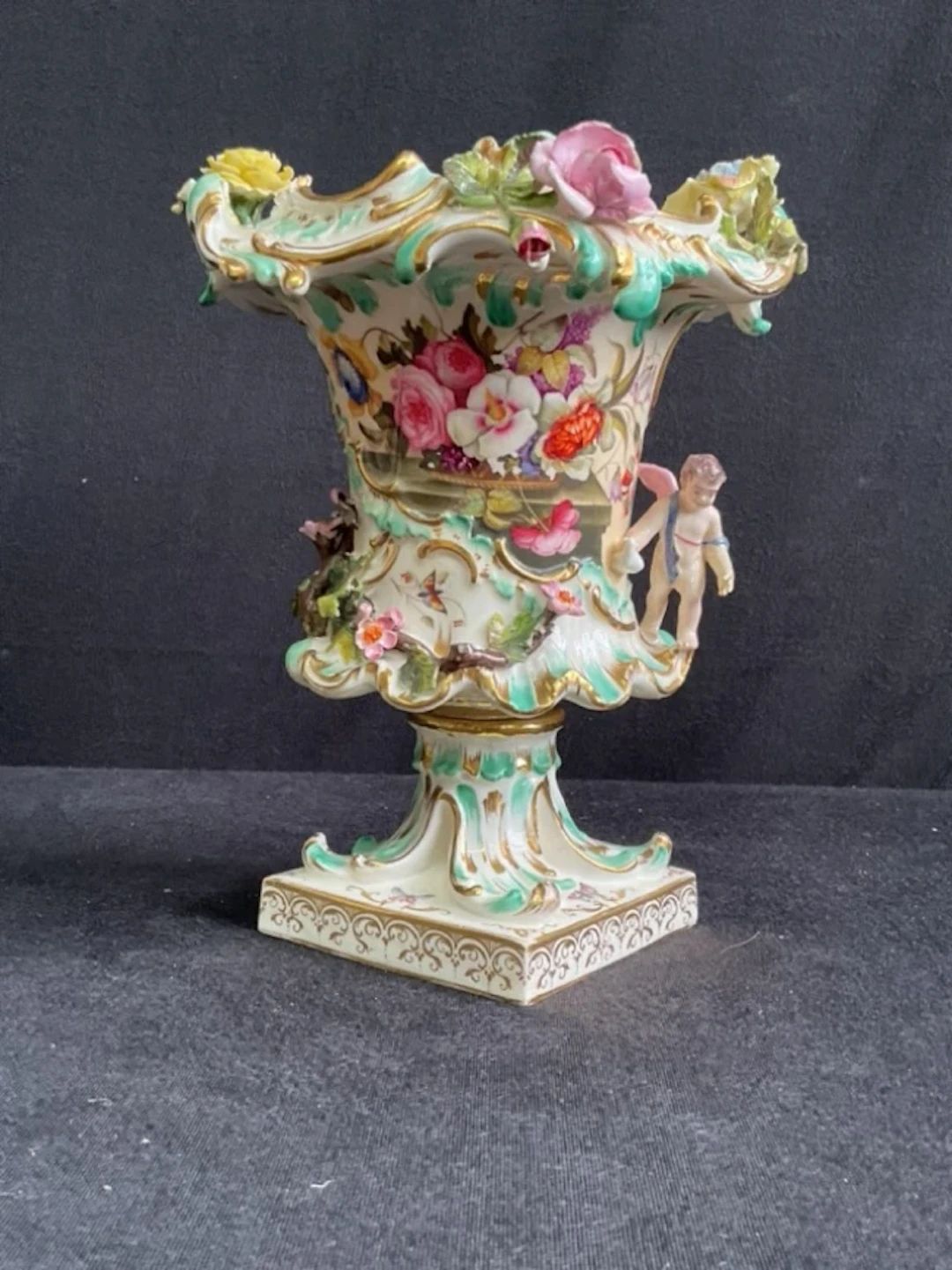 An early C19th Coalbrookdale porcelain campana vase elaborately moulded