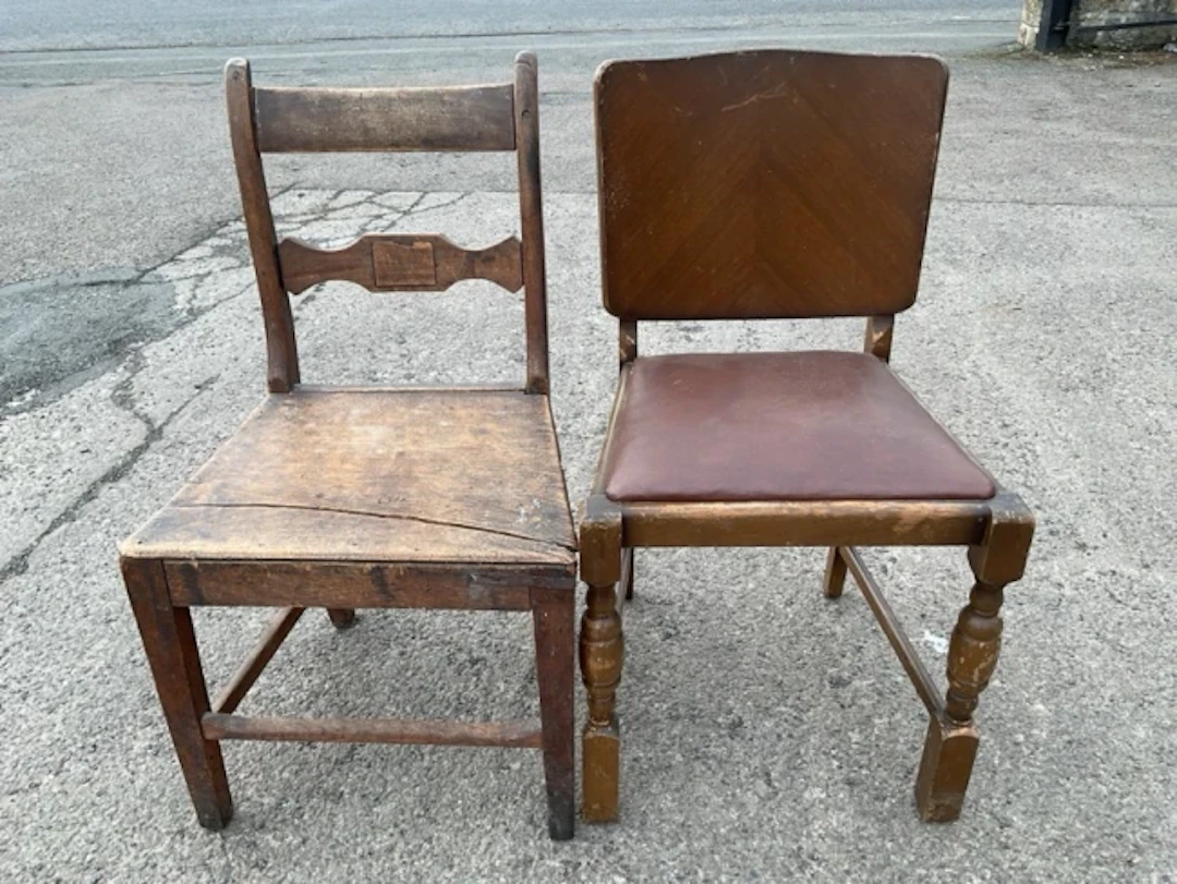 A C19th hardwood country chair with curved back and shaped rail above