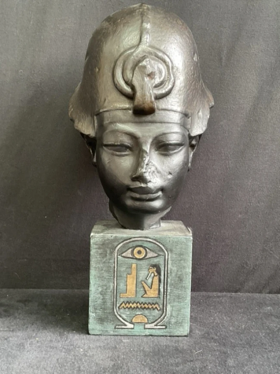 A plaster cast of the head of Pharaoh Amenhotep III as the god Osiris