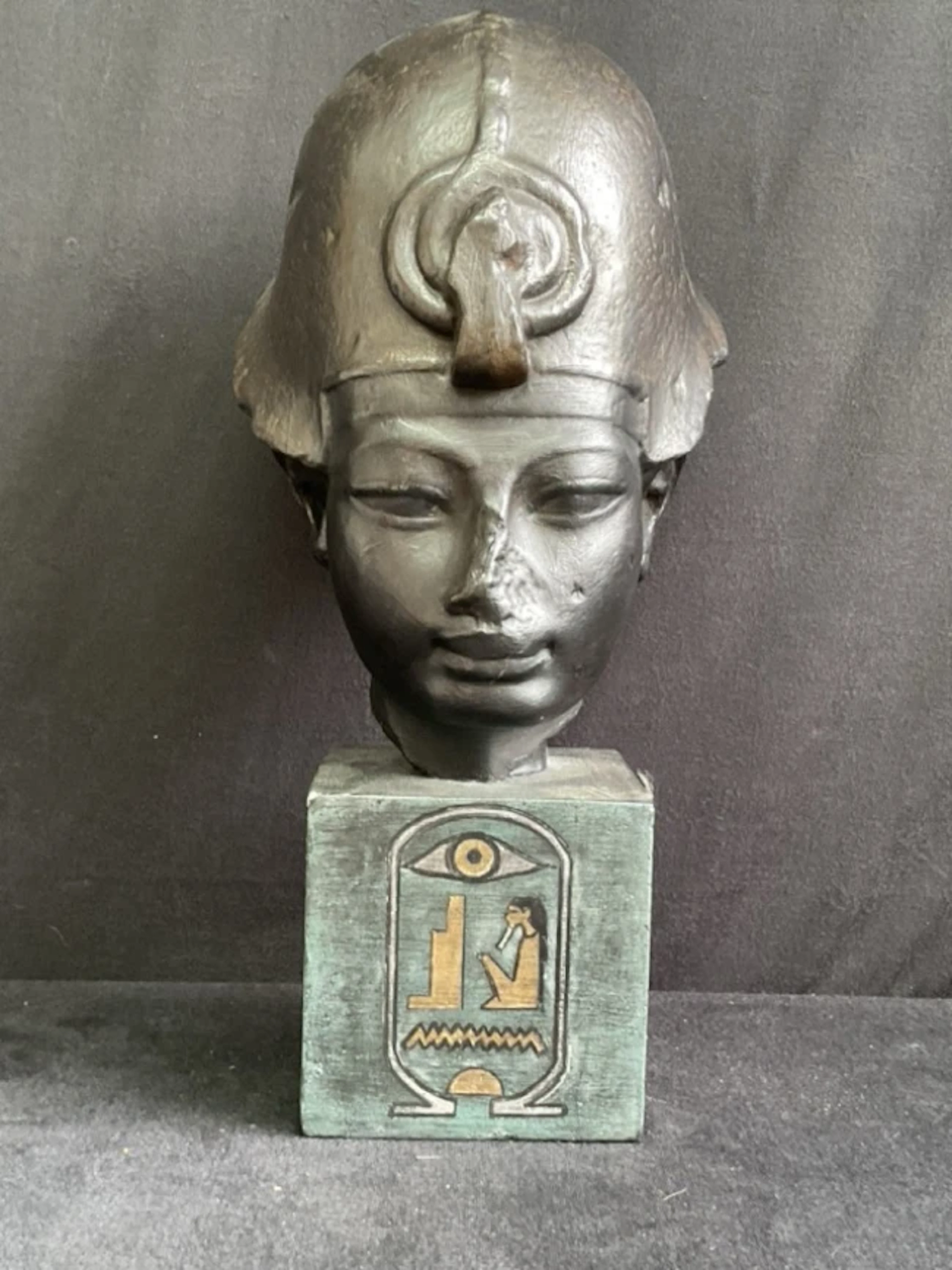 A plaster cast of the head of Pharaoh Amenhotep III as the god Osiris
