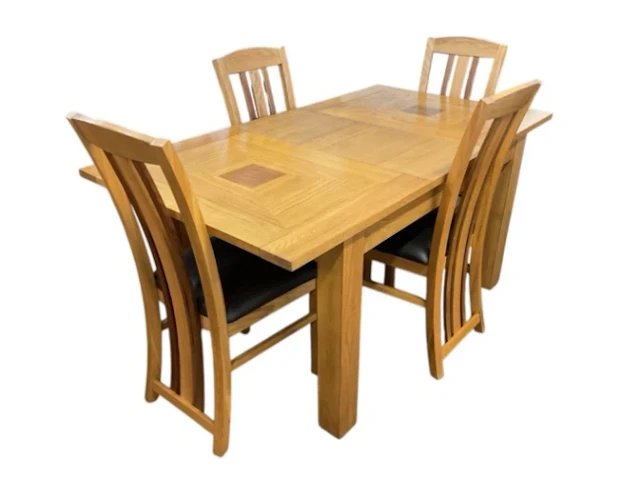 A contemporary oak dining table & chair set, the rectangular table