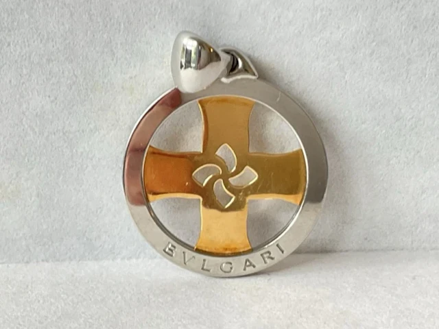 A Bvlgari stainless steel circular tondo pendant, having 18ct gold