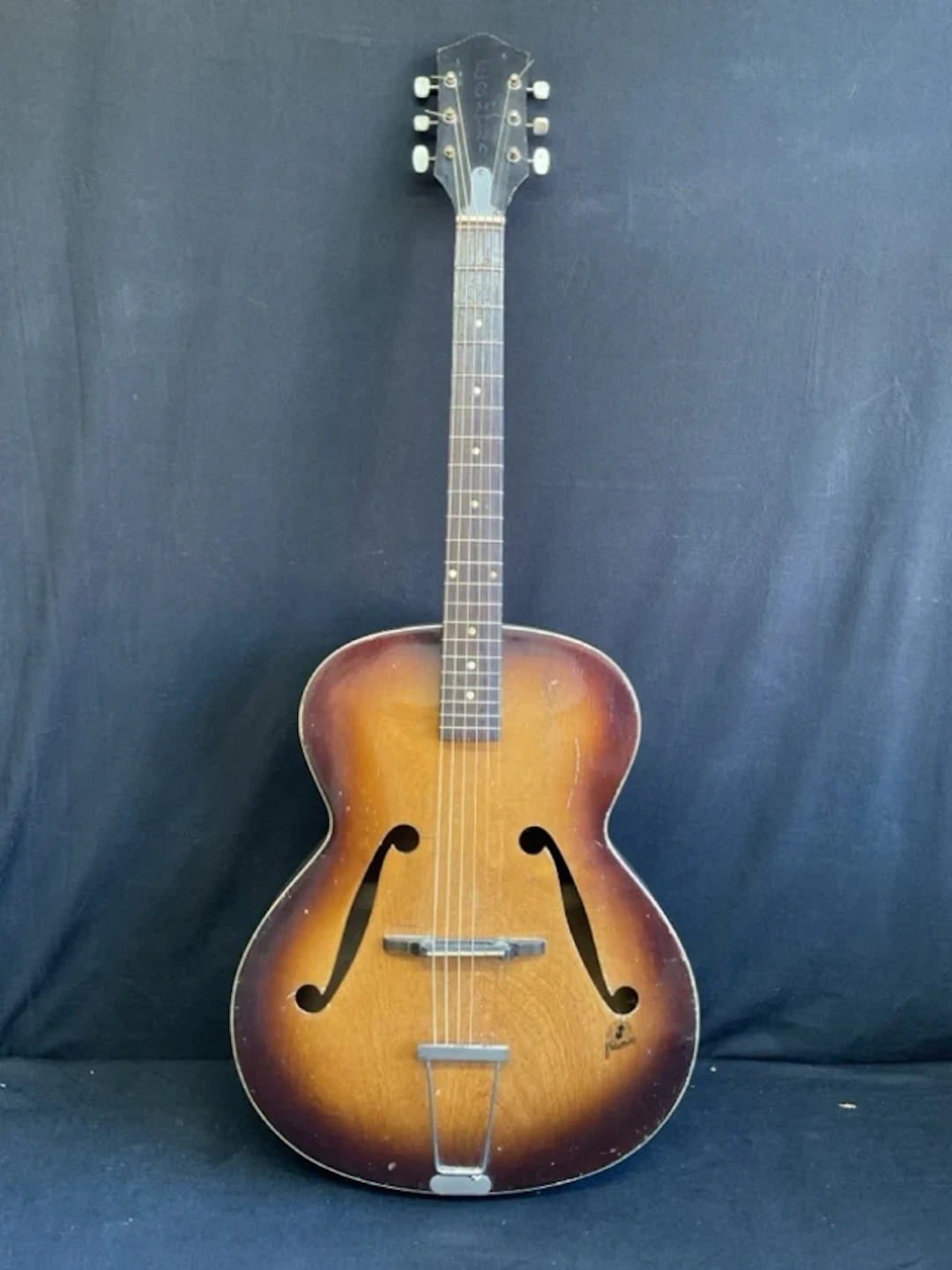 A 1960s Framus arch top steel string guitar with two-tone hollow body