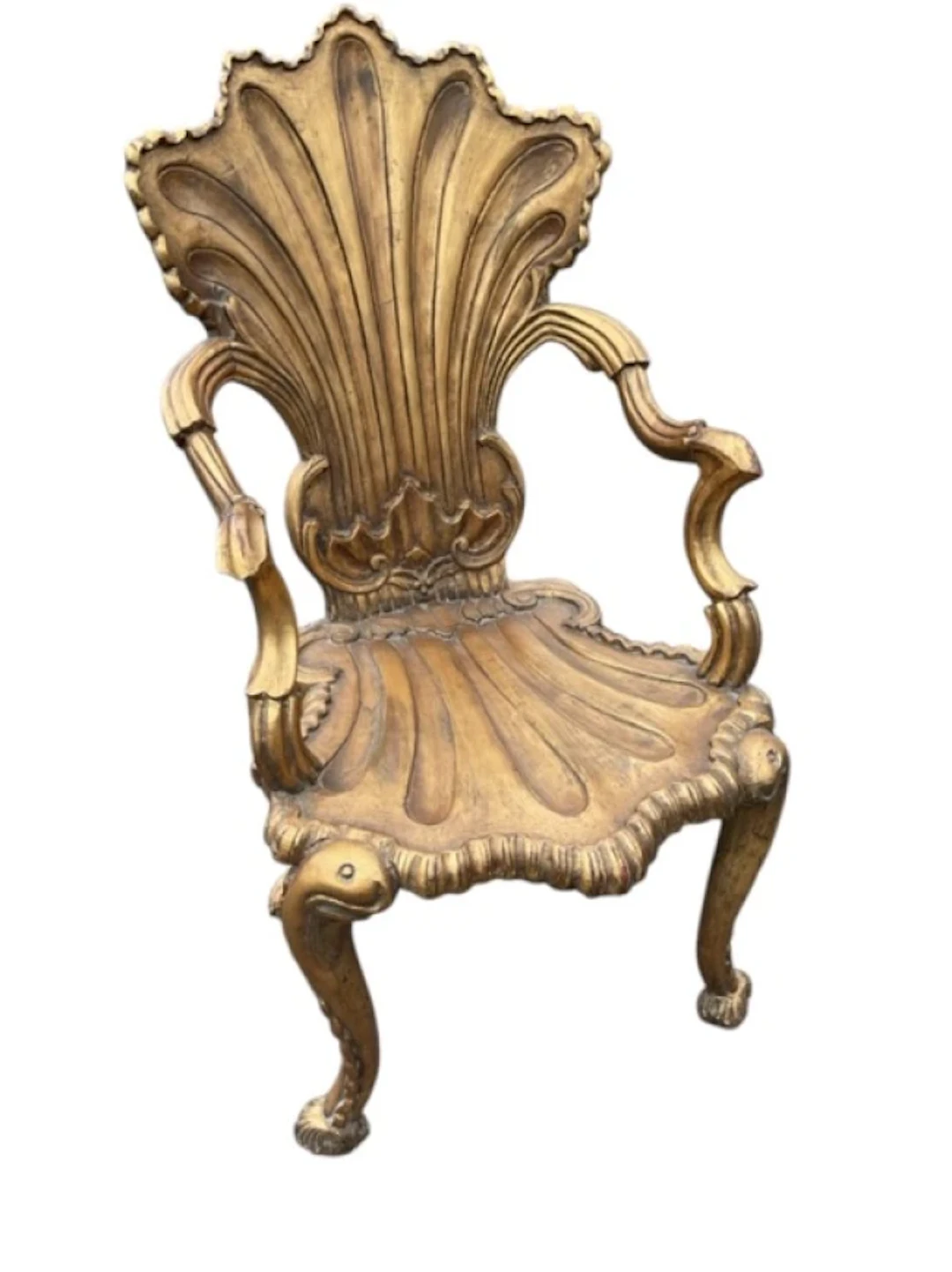 A C19th Italian giltwood grotto armchair with deeply carved shell