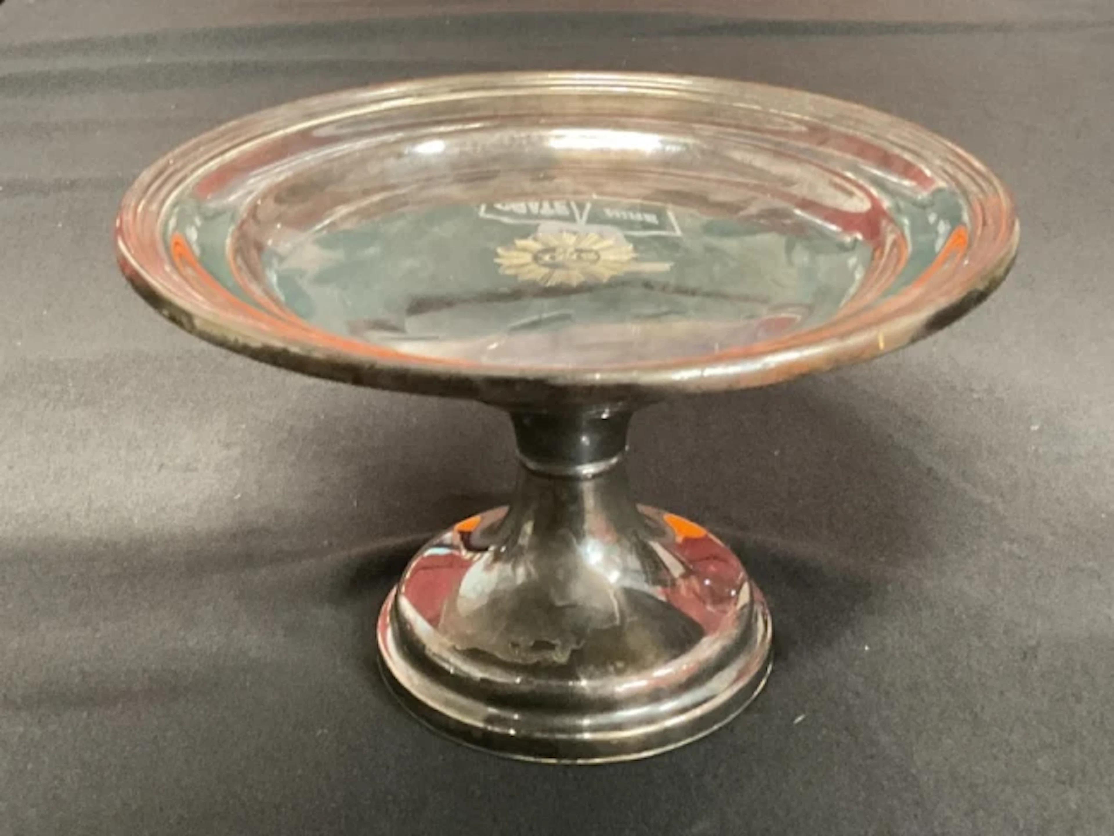 A silver plated ecclesiastical patten by James Dixon & Son of Sheffield