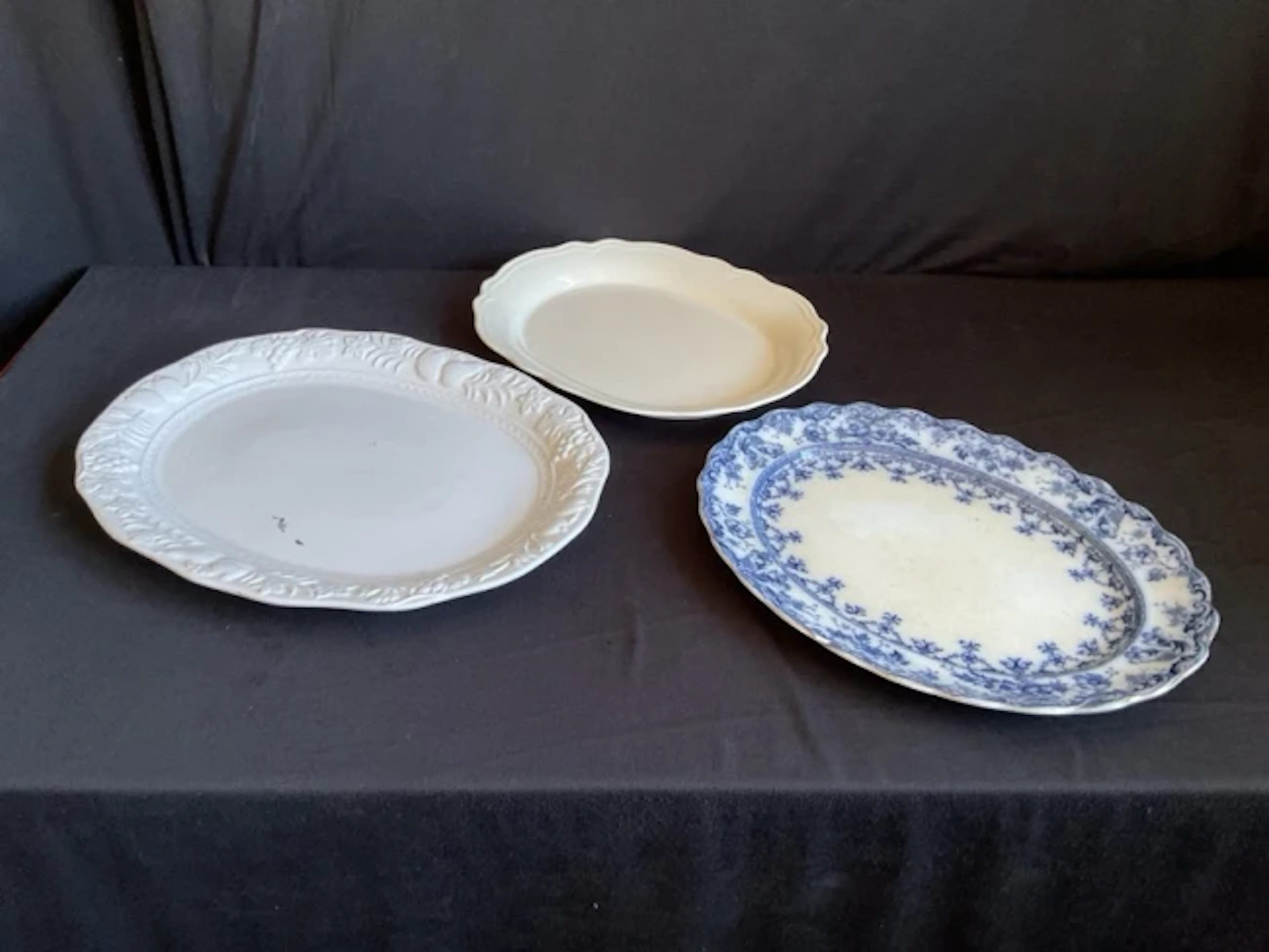 A Victorian ashet with gilt & floral decorated rim by SH of Warwick;