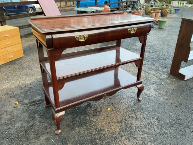 A Victorian mahogany buffet with rectangular moulded top above a cushion