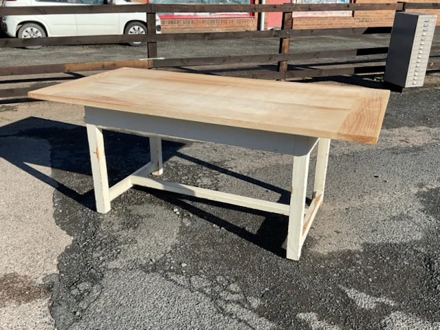 A painted kitchen table with an associated rectangular cleated elm