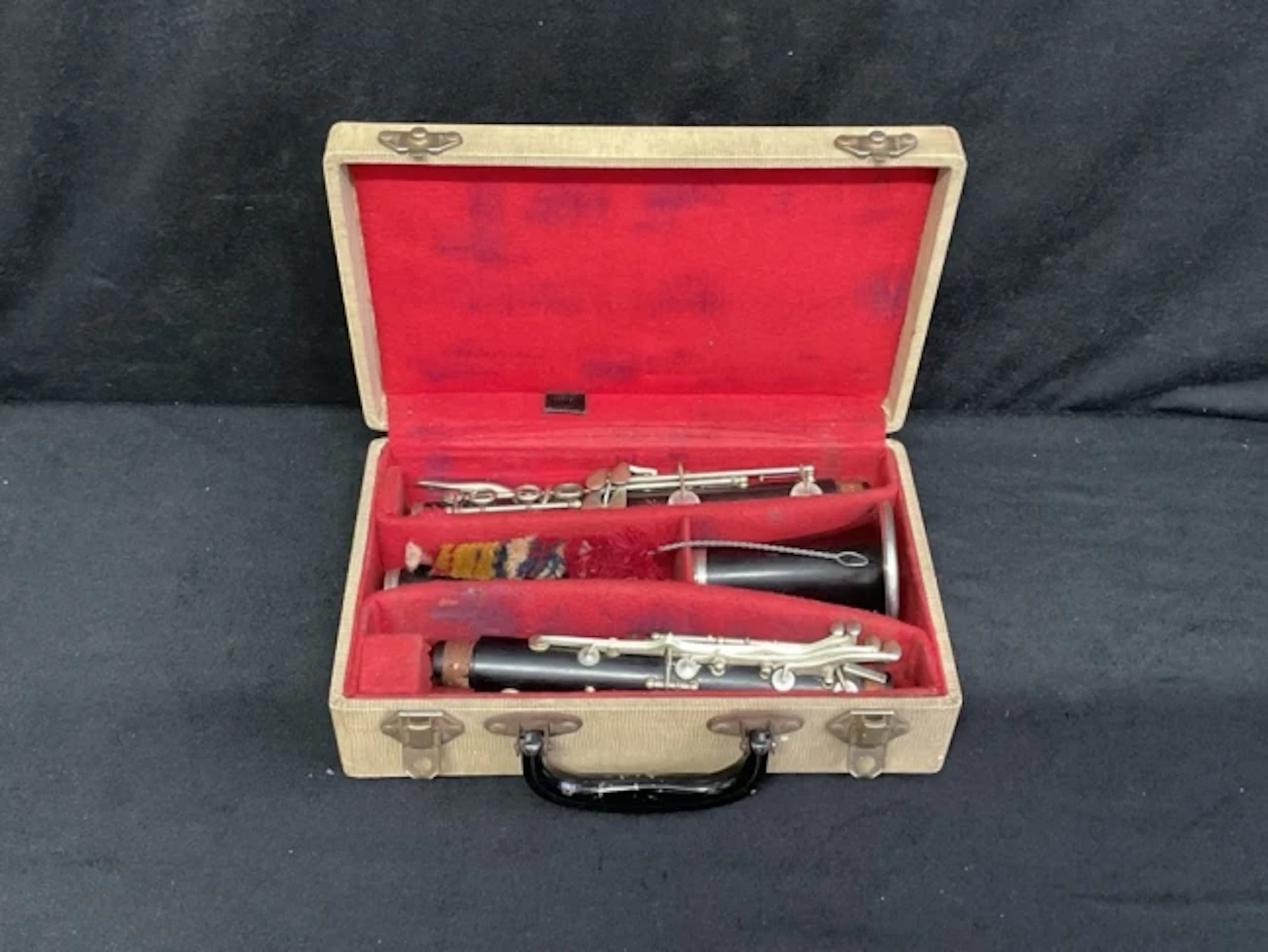 A Seliner faux snakeskin cased ebony clarinet by Console with nickel