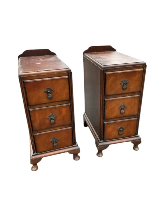 A pair of pedestal chests, each with rectangular moulded tops above