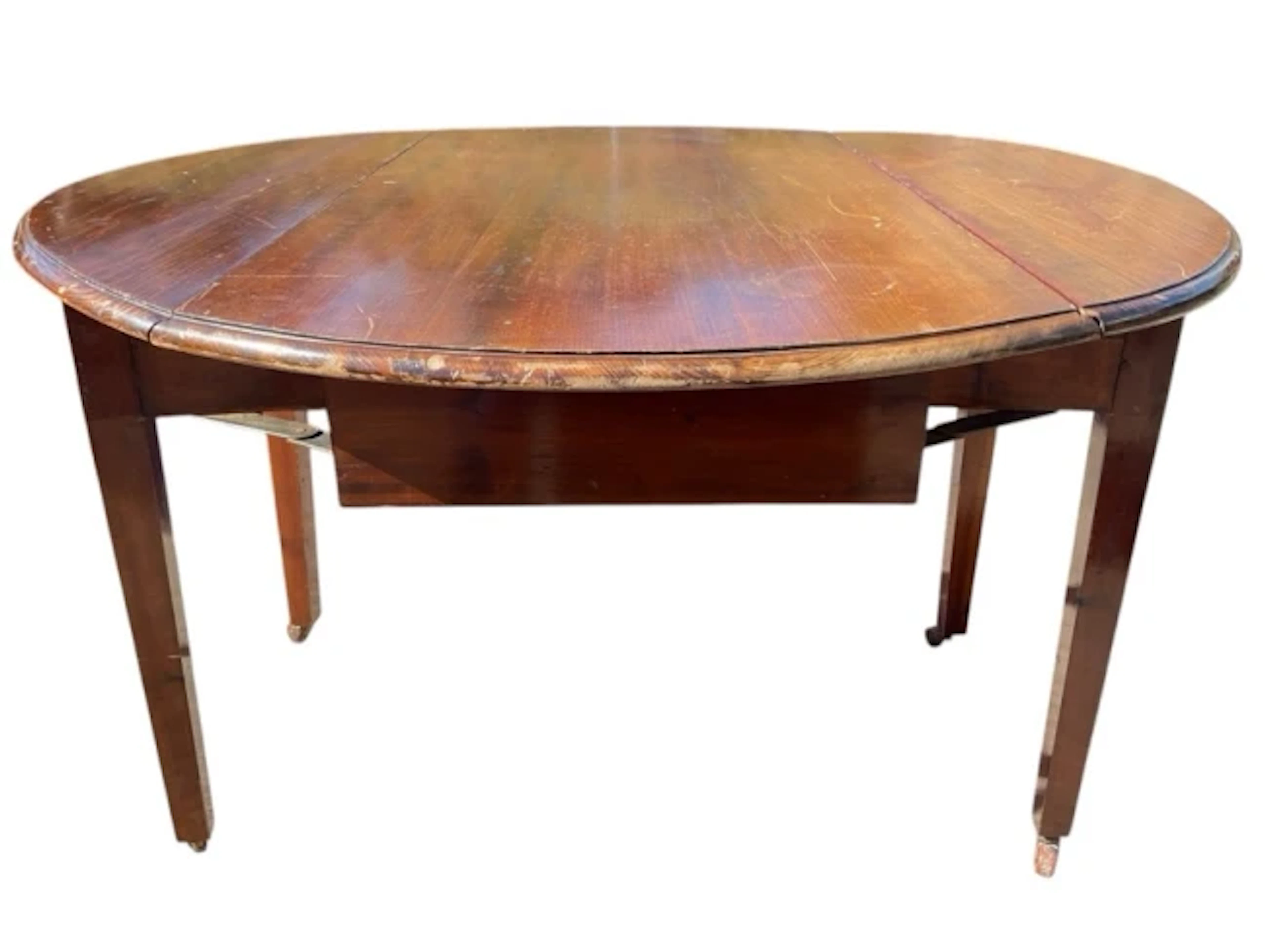 A circular Edwardian drop-leaf table, the moulded top with two leaves