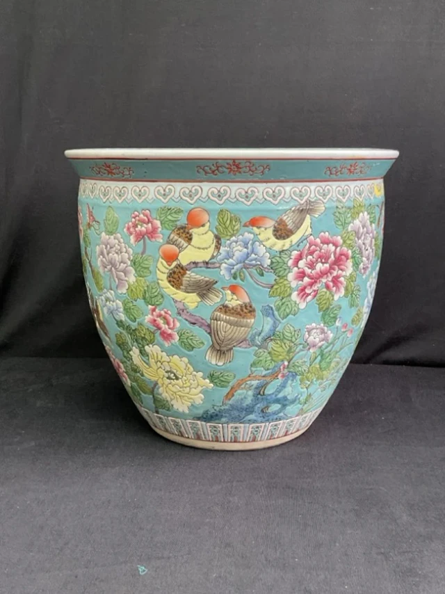 A large Chinese porcelain fish bowl, the ovoid body painted with sparrows