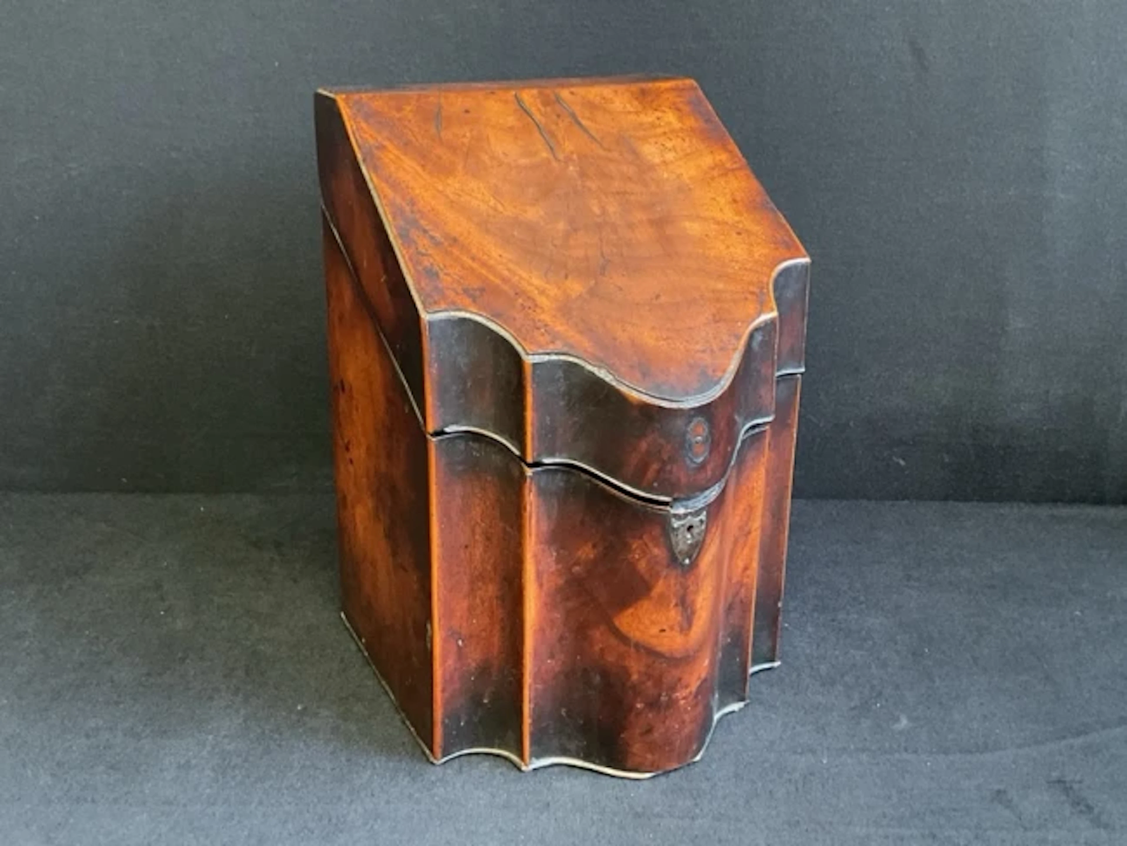 A Georgian boxwood strung mahogany knife box, the hinged sloped cover