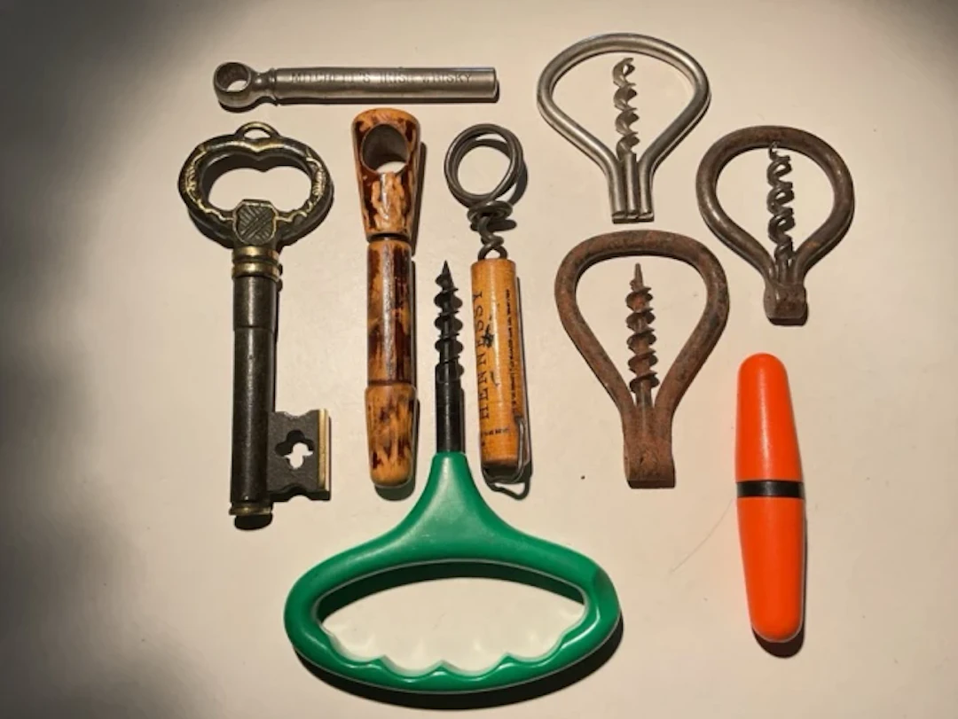 Corkscrew Collection A cast iron & brass key disguised corkscrew;