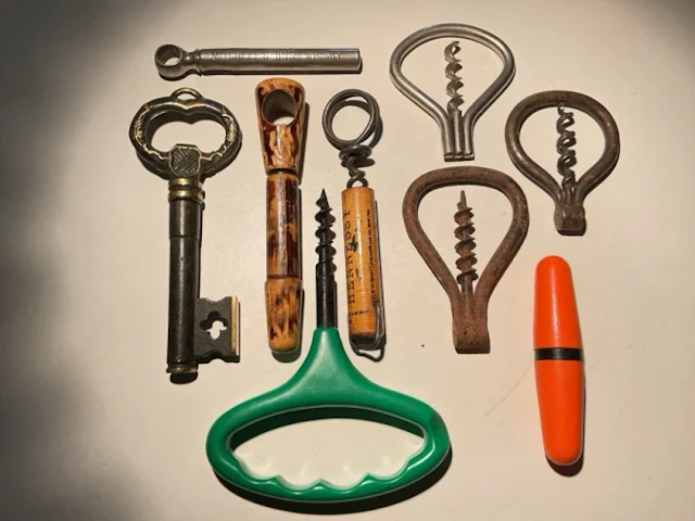 Corkscrew Collection A cast iron & brass key disguised corkscrew;