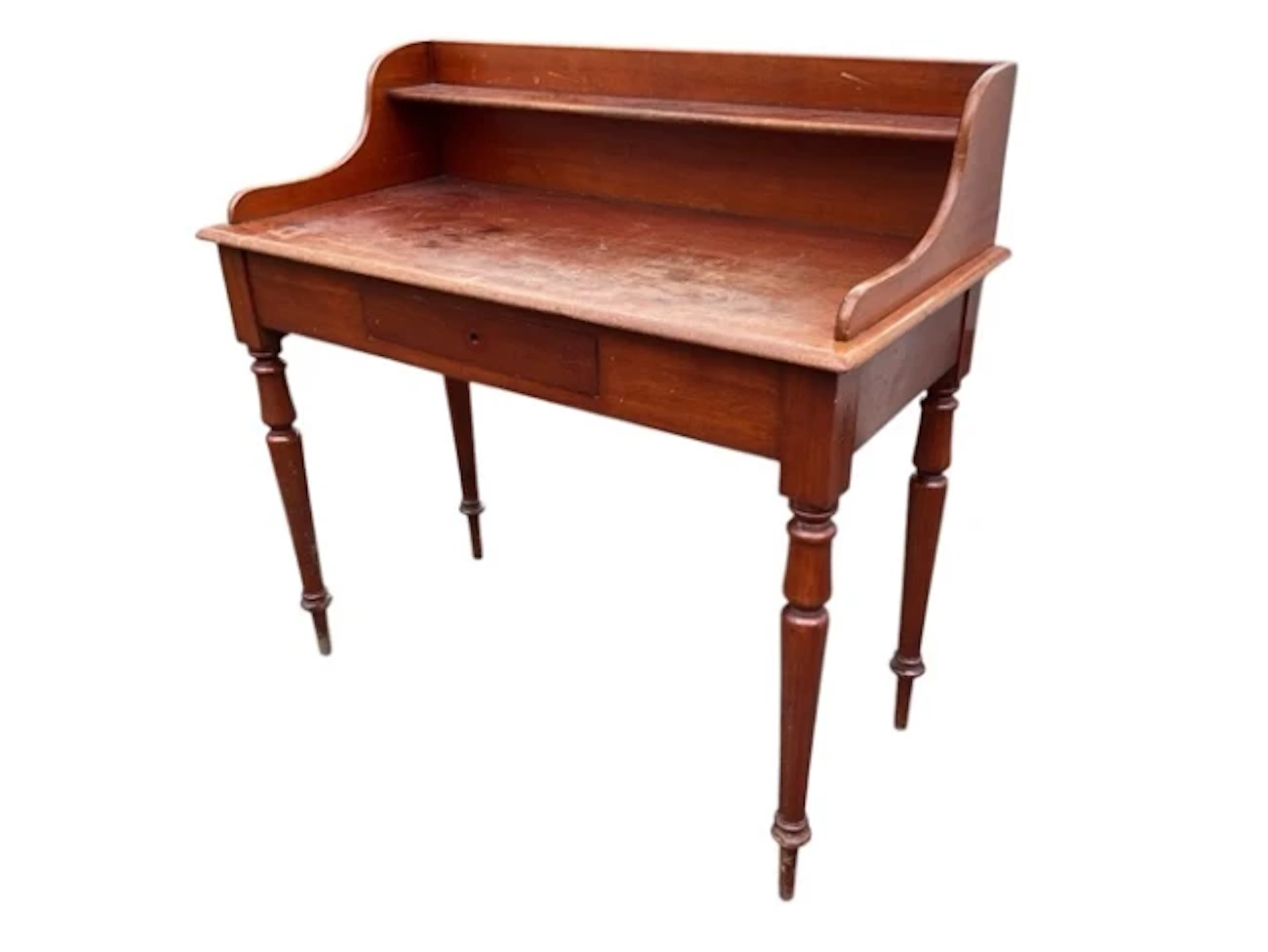 A Victorian mahogany washstand, the raised back and sides with a shelf