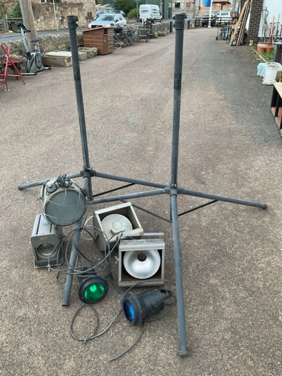 A pair of telescopic folding tripod stands; together with six miscellaneous