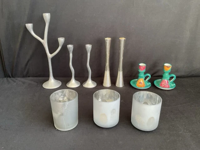 A cast stylised tree candelabra with matching candlesticks; a pair