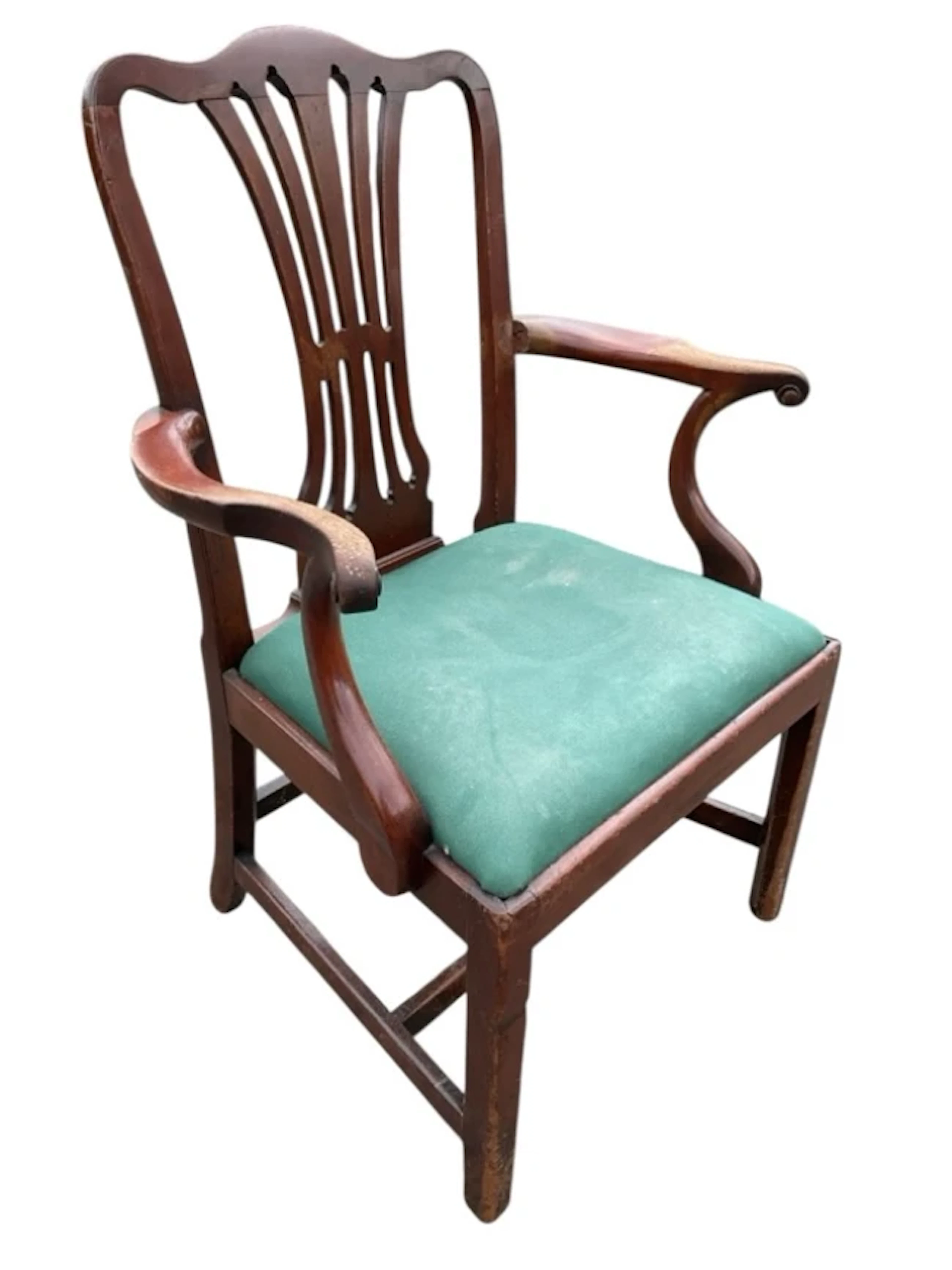 A Georgian mahogany style armchair with camel back and pierced splat