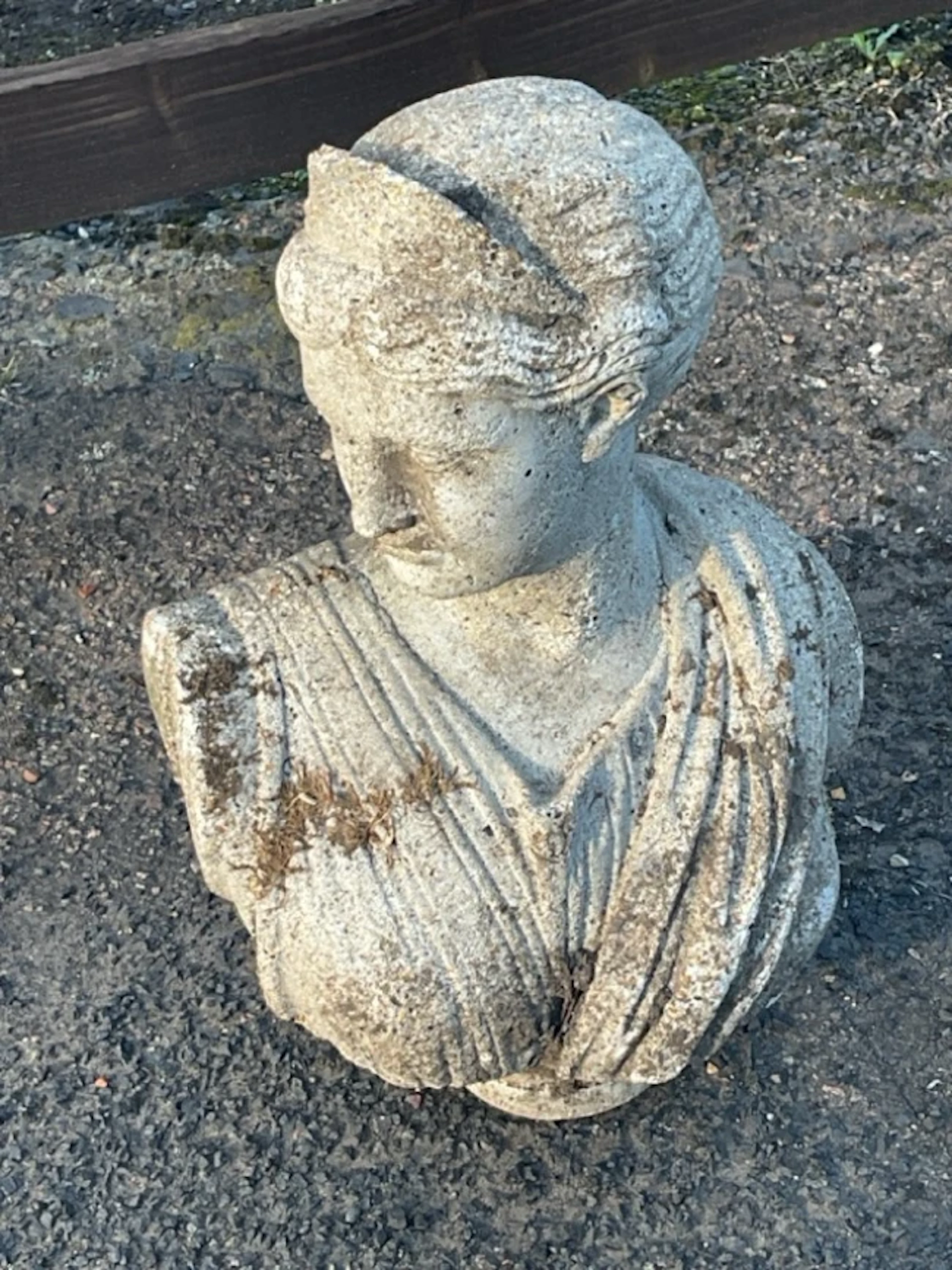 A composition stone bust of a classical cloaked tiara wearing lady. (17in)