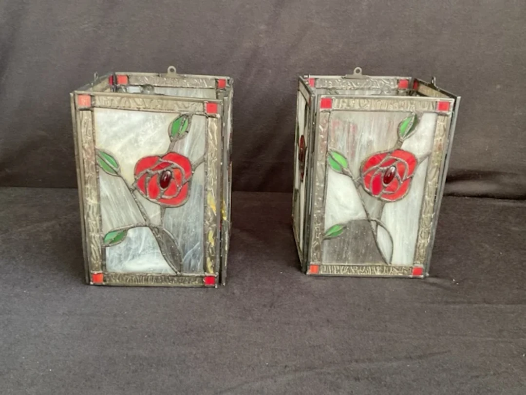 A pair of four-sided rectangular leaded stained glass pendant lanterns