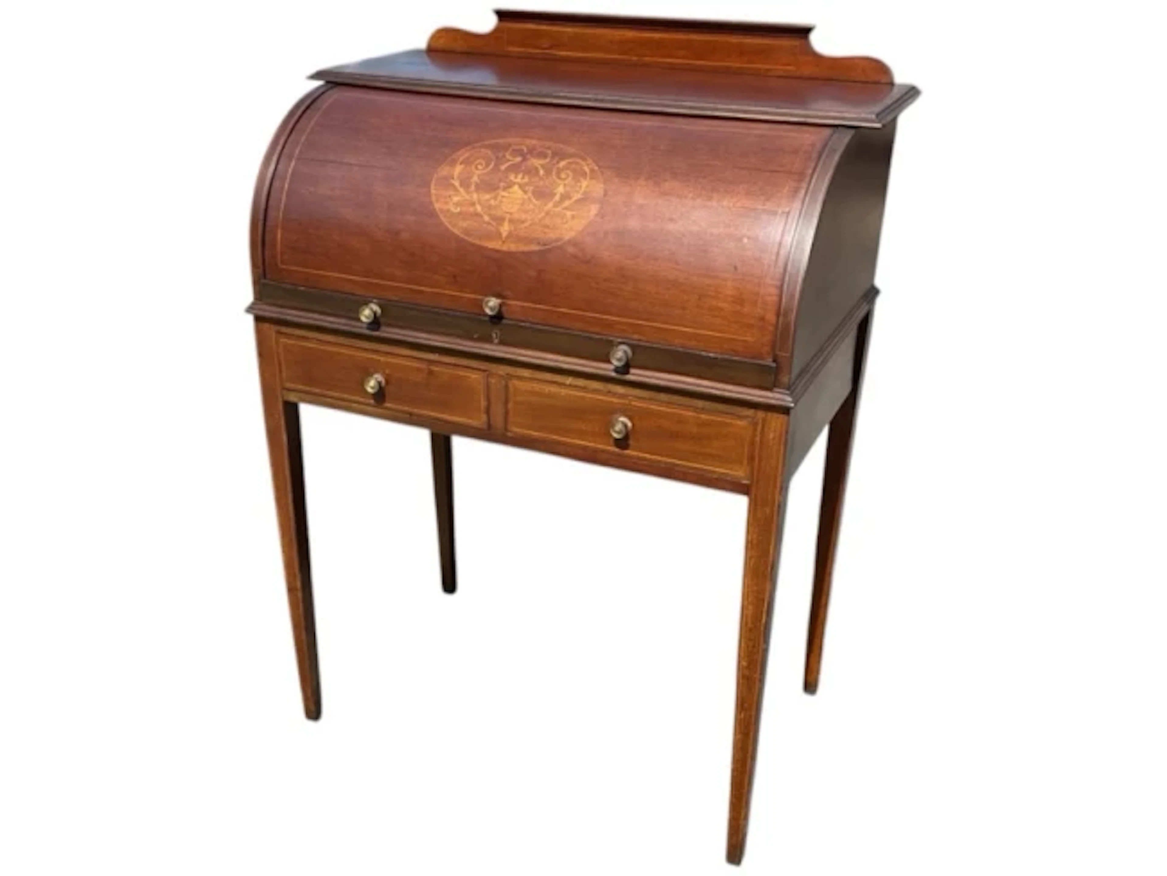 An Edwardian mahogany cylinder bureau inlaid with boxwood stringing